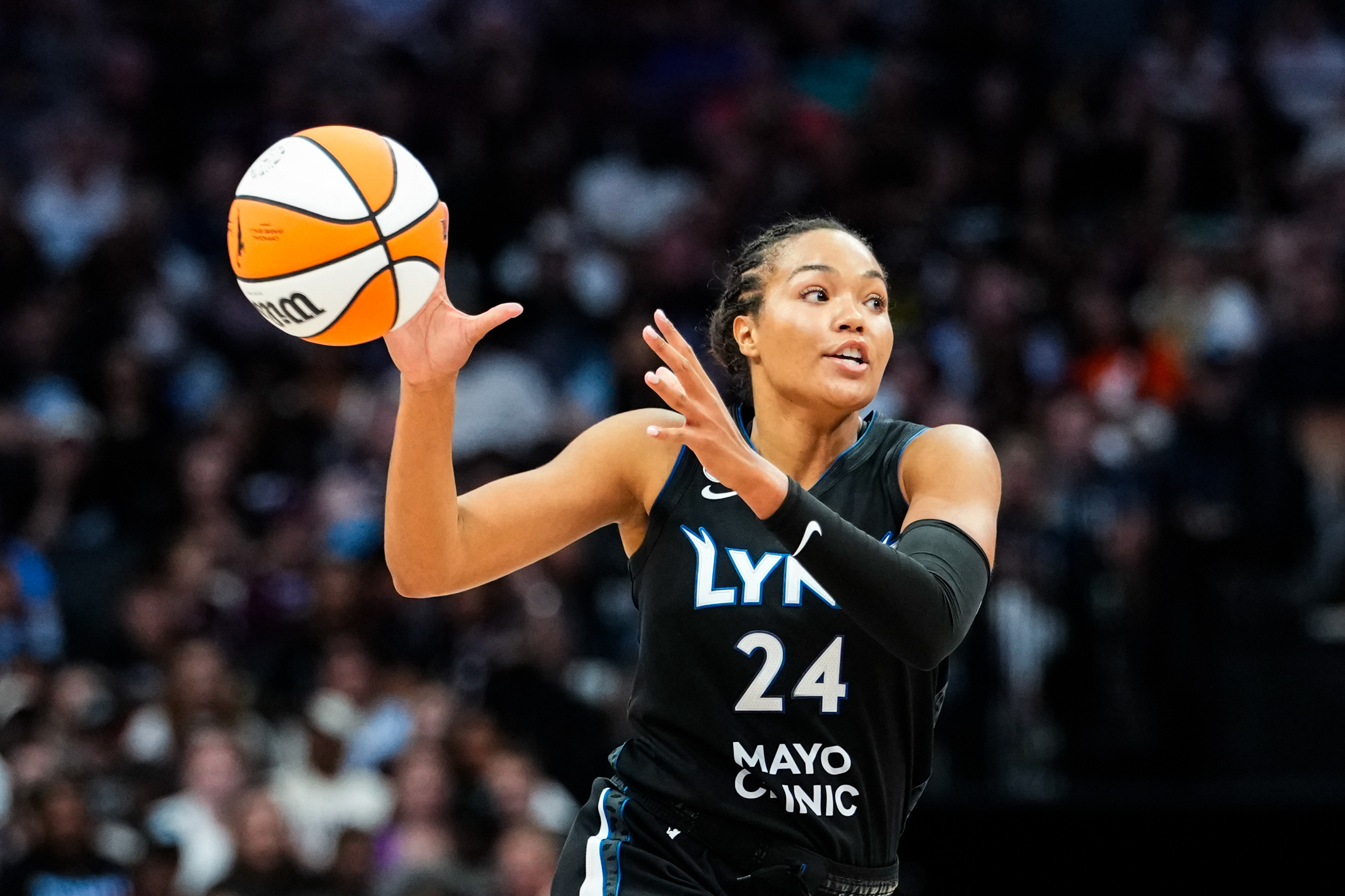 Minnesota Lynx forward Napheesa Collier (24) catches the ball as we break down our Aces vs. Lynx prediction.