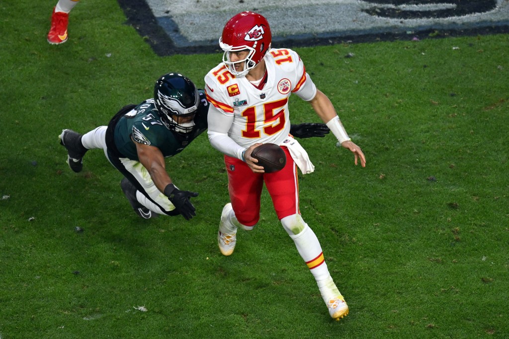 Kansas City Chiefs' quarterback Patrick Mahomes is tackled as we rank the best Super Bowl performances from Mahomes ahead of Super Bowl 58. 