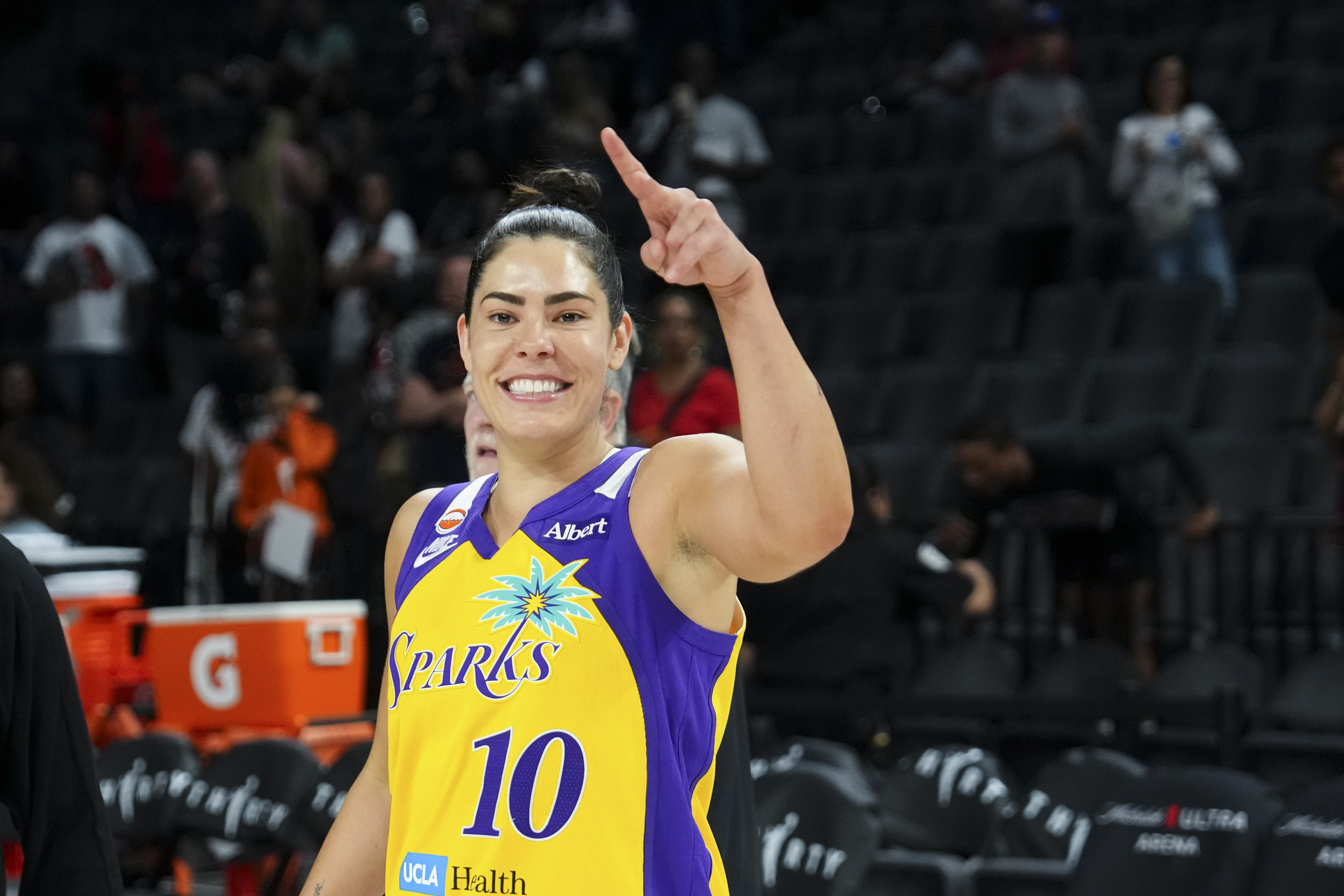 Los Angeles Sparks guard Kelsey Plum (10), seen here gesturing during a game, is featured in our Sparks vs. Storm prediction.