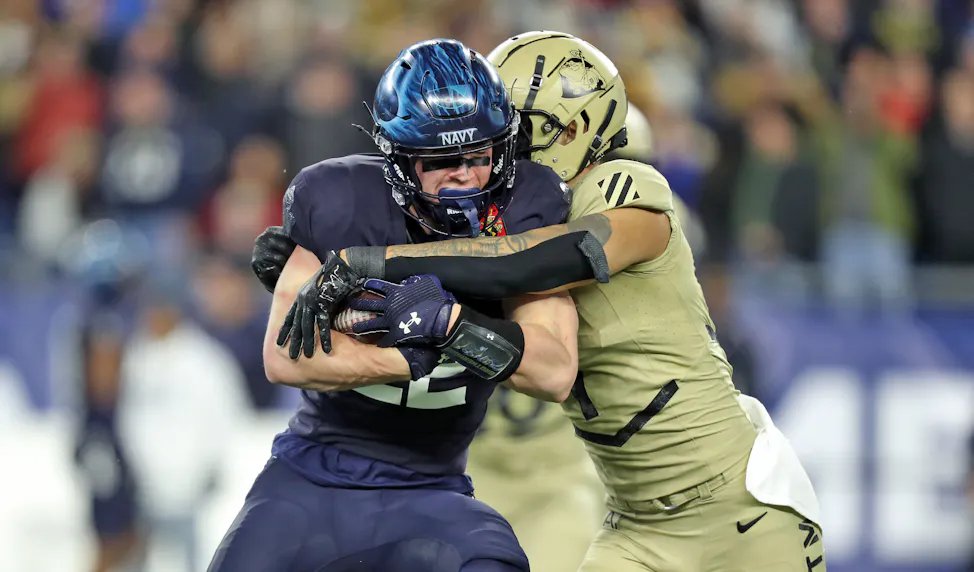 Navy Midshipmen wide receiver Eli Heidenreich catches a pass against the Army Black Knights during the second half of the Army-Navy Game as we look at our Navy vs. Air Force Player Prop Bet Odds & Touchdown Picks.