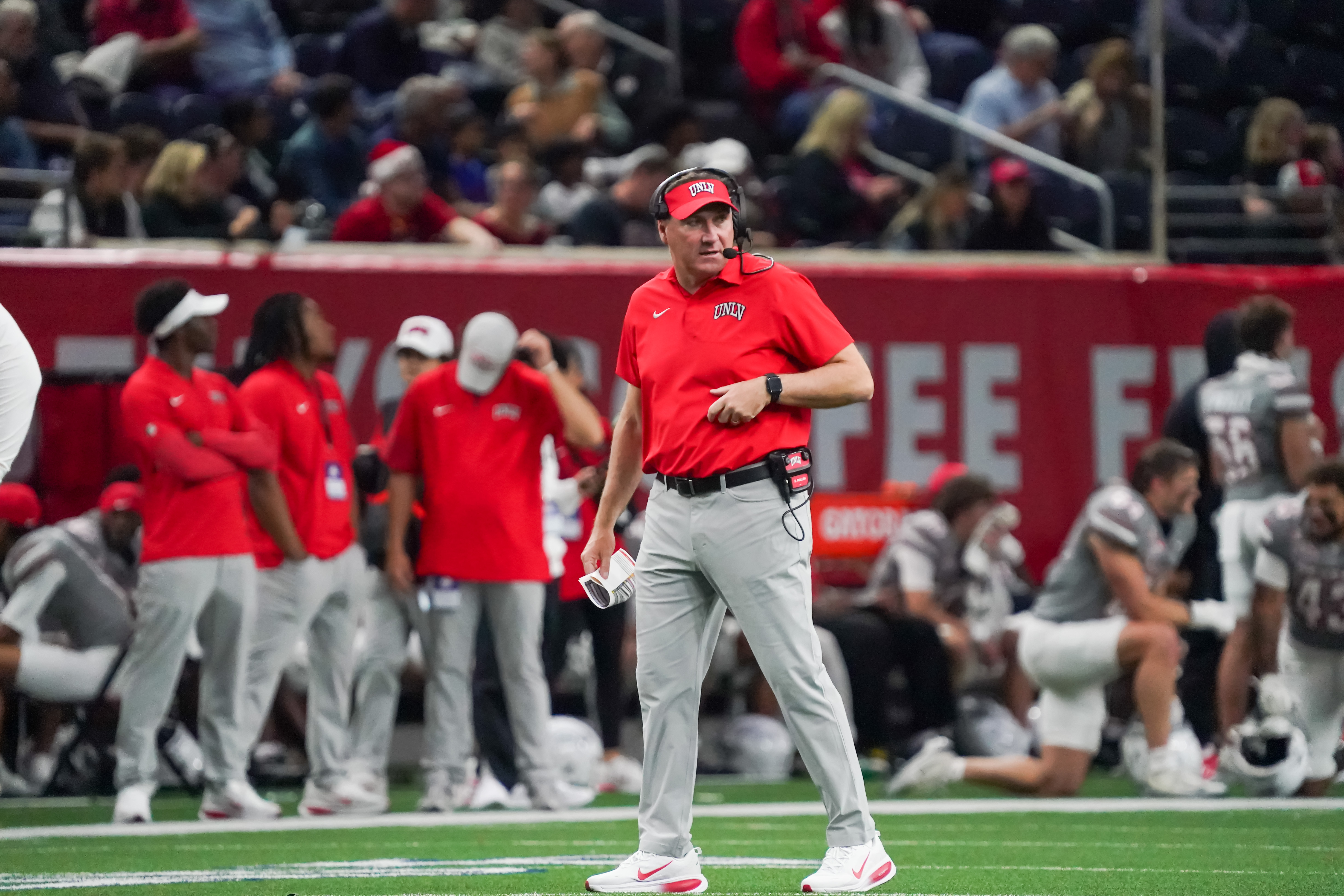 UNLV Rebels head coach Dan Mullen on the field as we break down our Memphis vs. UNLV prediction.