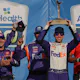 Denny Hamlin, driver of the No. 11 FedEx Express Toyota, lifts the Kansas Speedway trophy in victory lane as we preview the 2024 AdventHealth 400 at Kansas Speedway.