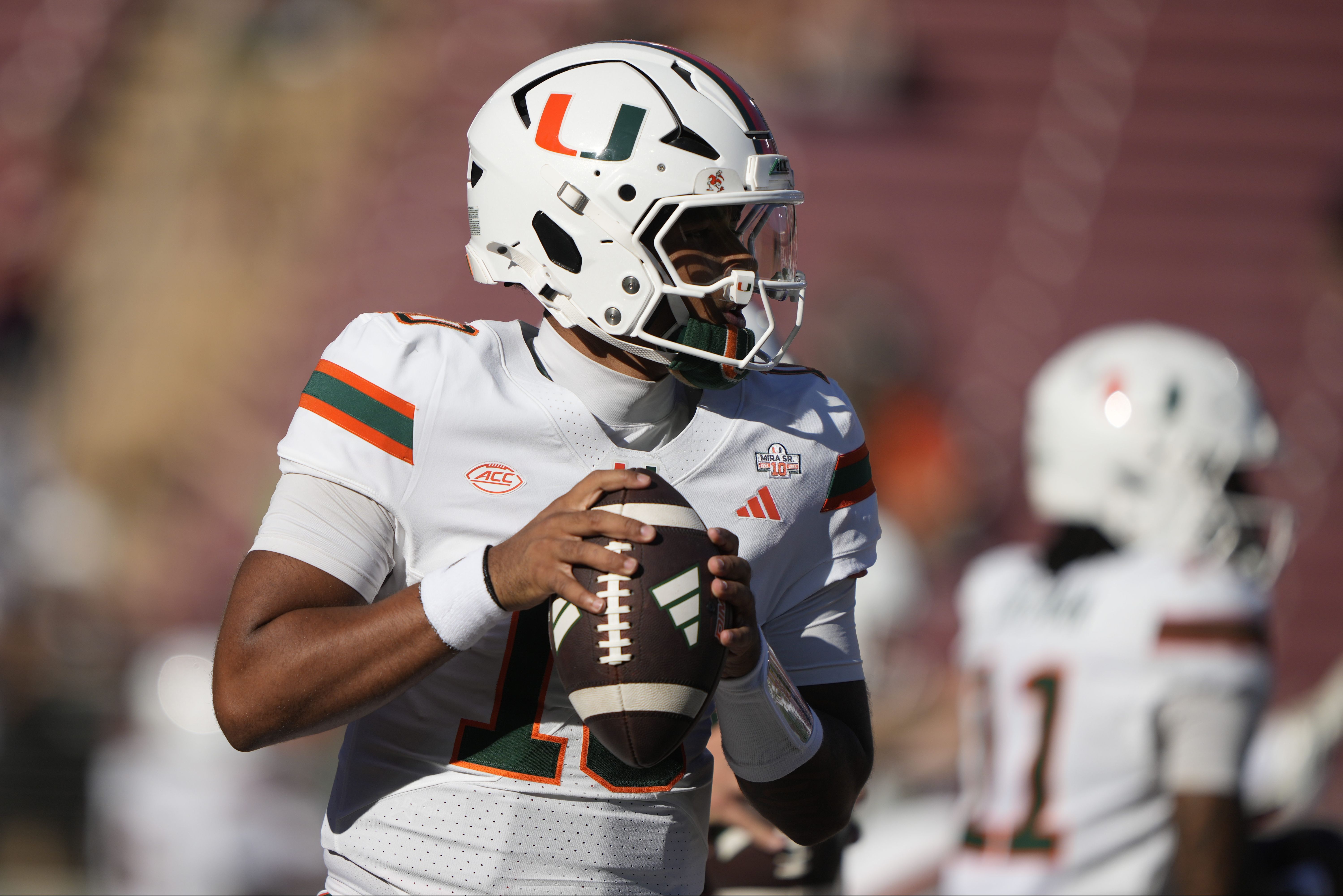 Miami Hurricanes quarterback Darian Mensah (10) warms up as we break down the latest 2026 Heisman Trophy odds.