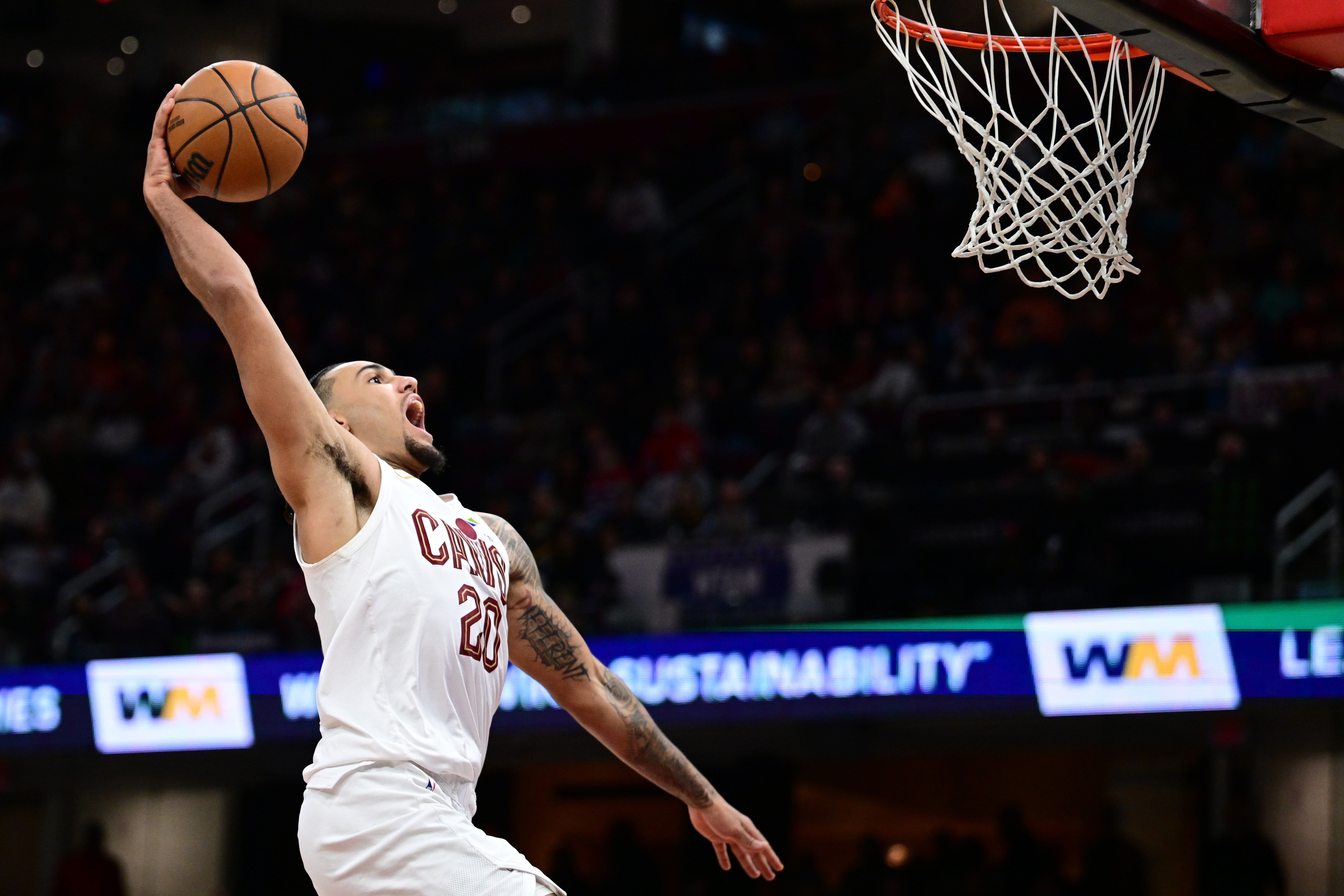 Cleveland Cavaliers guard Jaylon Tyson (20) goes up for a dunk as we break down our NBA player props & best bets tonight.