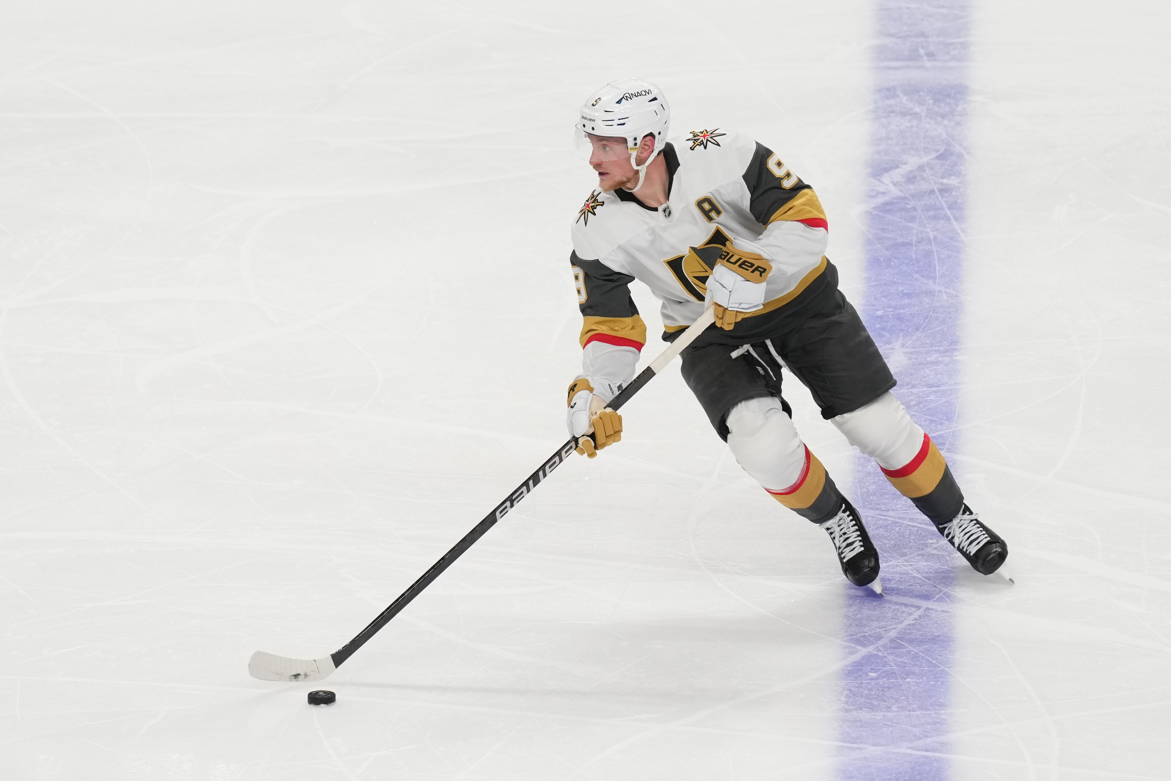 Vegas Golden Knights center Jack Eichel (9) skates with the puck as we provide our NHL player props today.