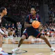 Tristen Newton of the UConn Huskies drives against the Gonzaga Bulldogs. The Connecticut Huskies defeated the Gonzaga Bulldogs 76-63. We're backing Newton in our March Madness MVP predictions.
