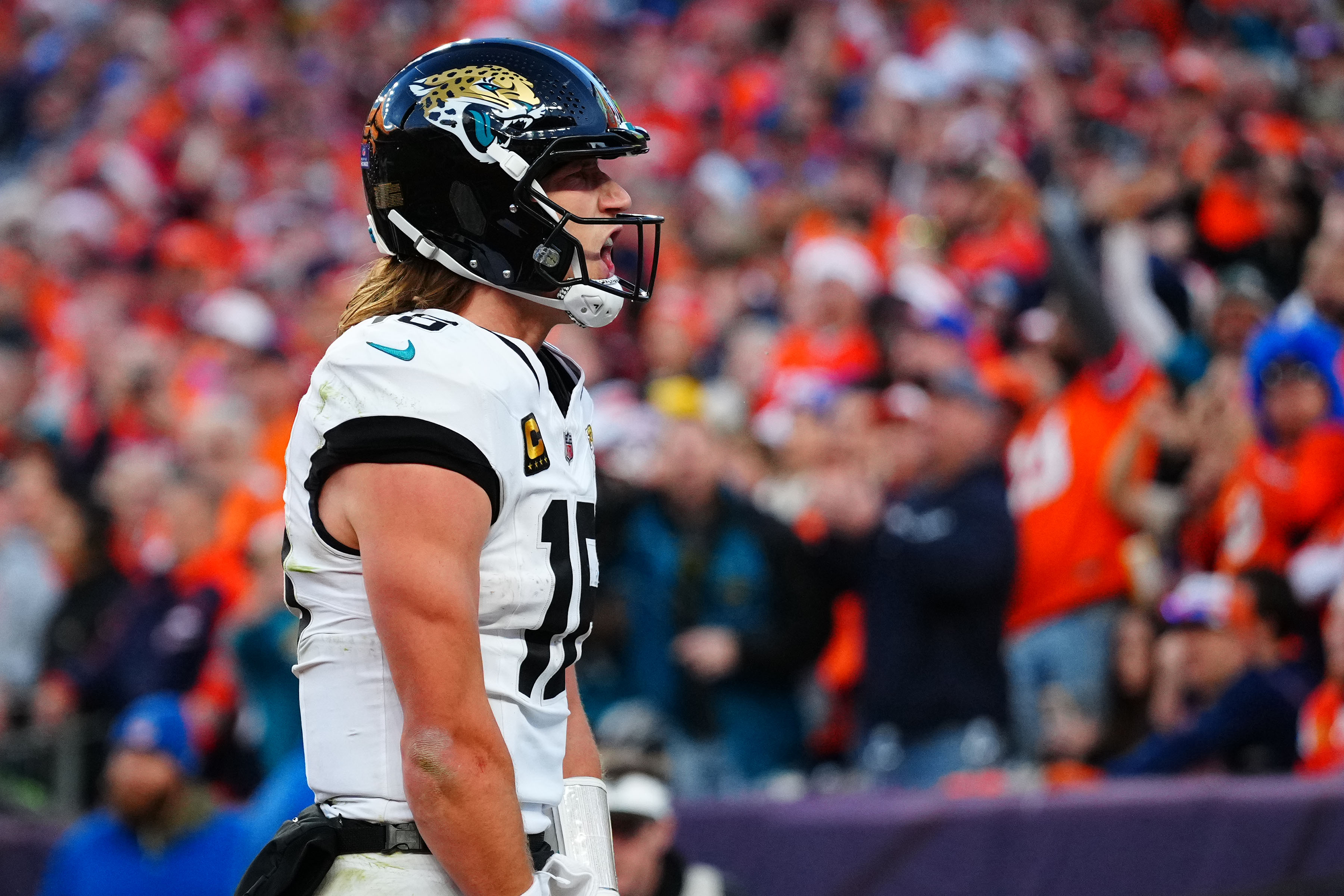 Jacksonville Jaguars quarterback Trevor Lawrence (16) reacts against the Denver Broncos as we break down our NFL playoff bracket predictions.