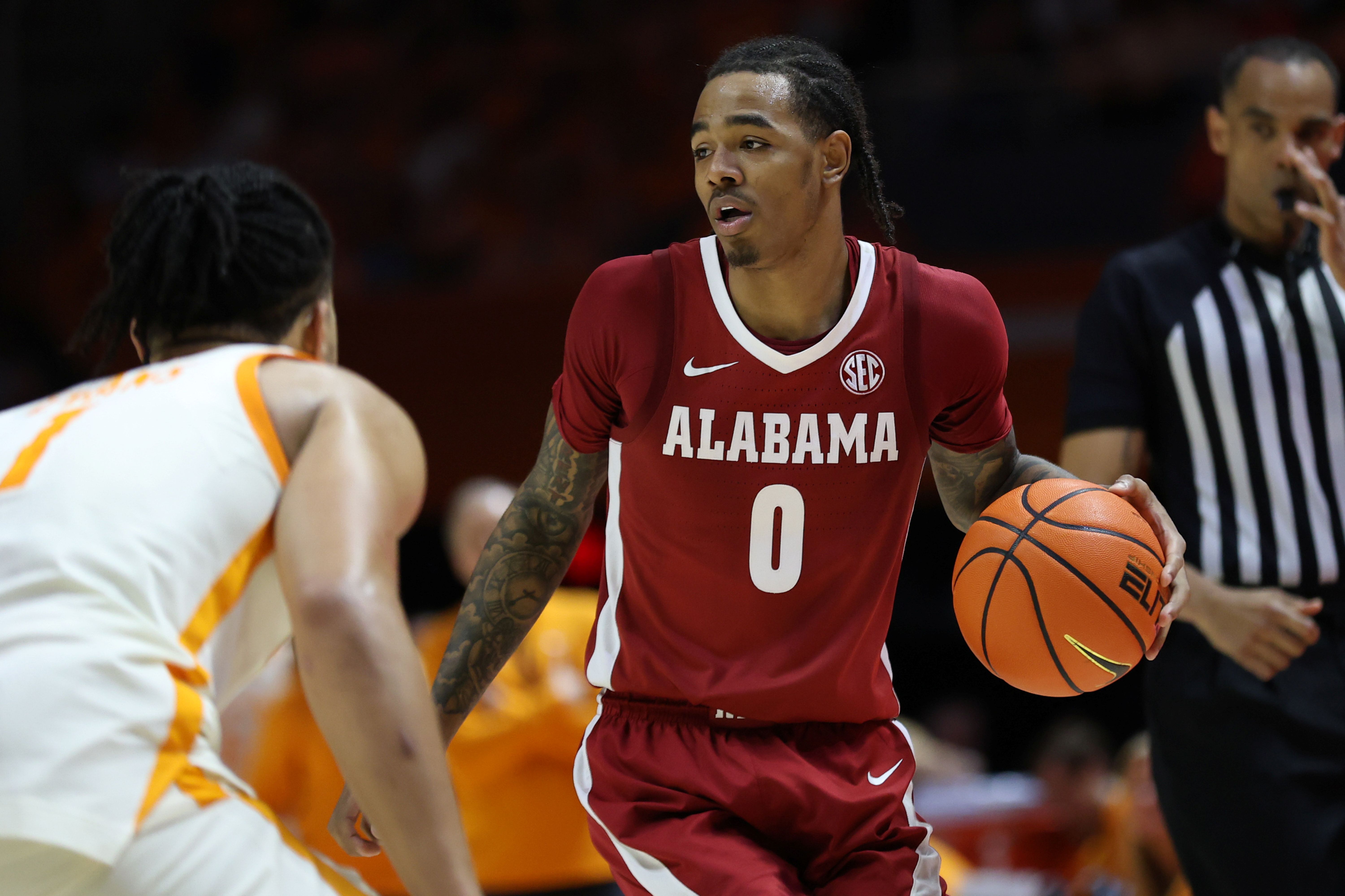 Alabama Crimson Tide guard Labaron Philon brings the ball up court, and he's featured in our Auburn vs. Alabama predictions
