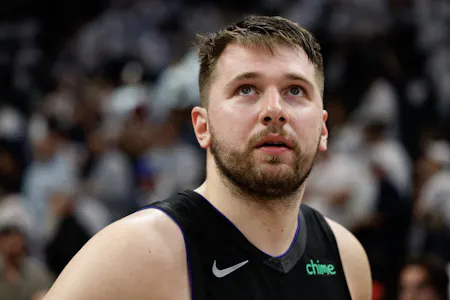 Luka Doncic looks on after defeating the Minnesota Timberwolves in Game 2 as offer our best prop picks for tonight's Game 3 of the Western Conference Finals. 