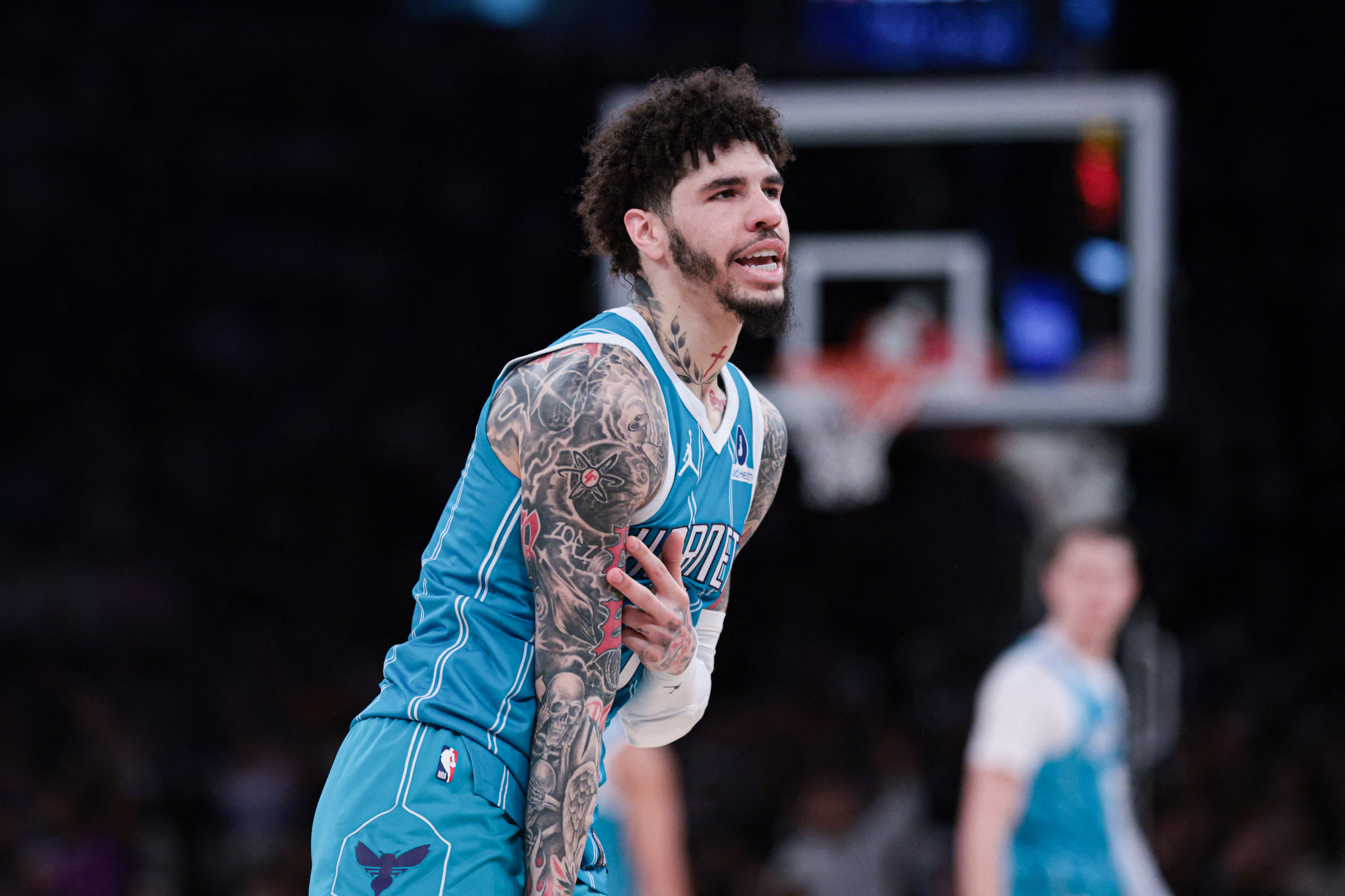 Charlotte Hornets guard LaMelo Ball (1), seen here reacting during a game, is featured in our Hornets vs. Magic player props today.