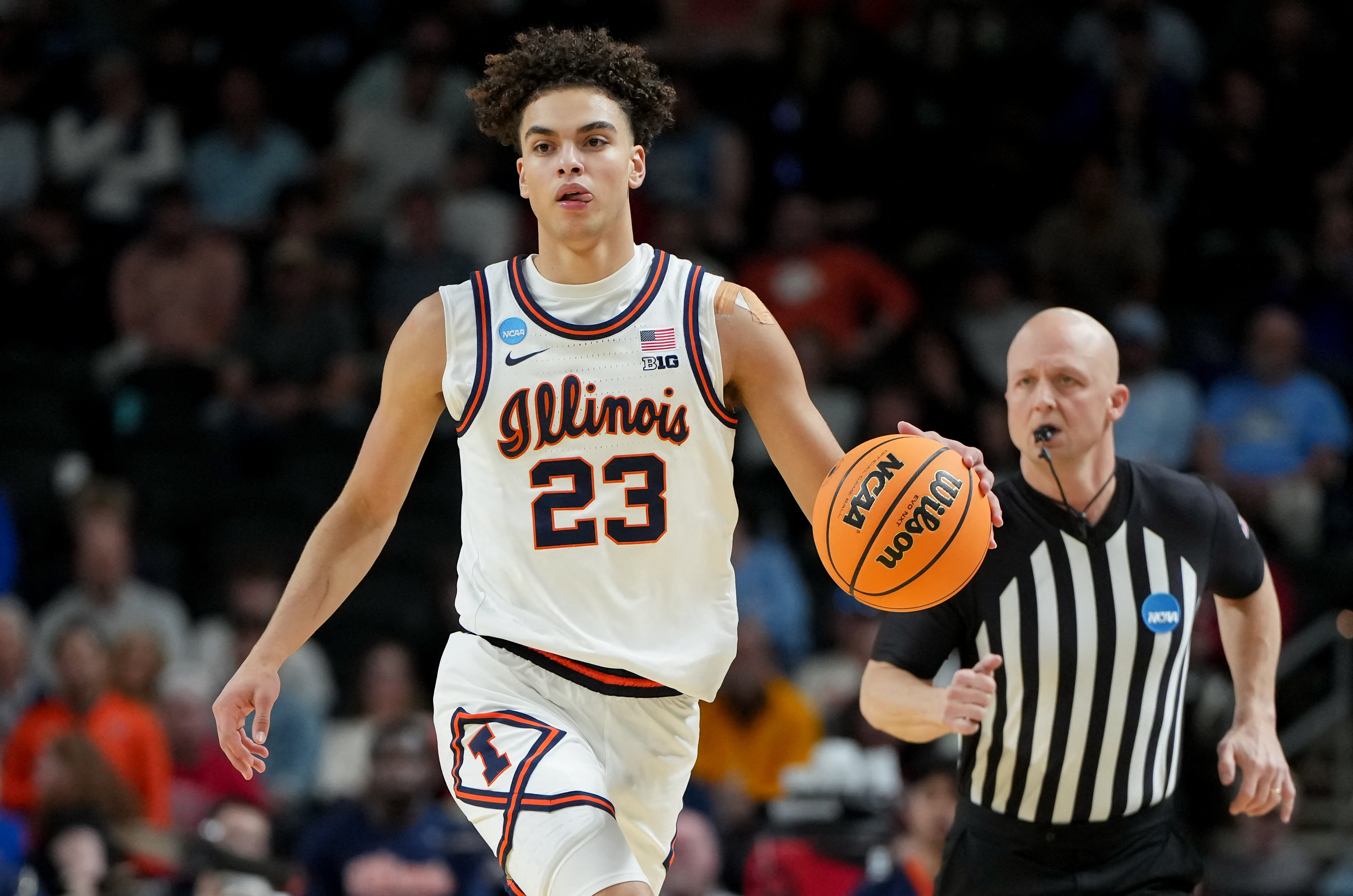 Illinois Fighting Illini guard Keaton Wagler (23), seen here dribbling the ball, is featured in our NBA Draft stock watch.