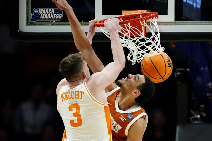 Dalton Knecht of the Tennessee Volunteers dunks the ball against Dylan Disu of the Texas Longhorns during the the second round of the NCAA Men's Basketball Tournament. We're backing Knecht in our March Madness player props and best bets.