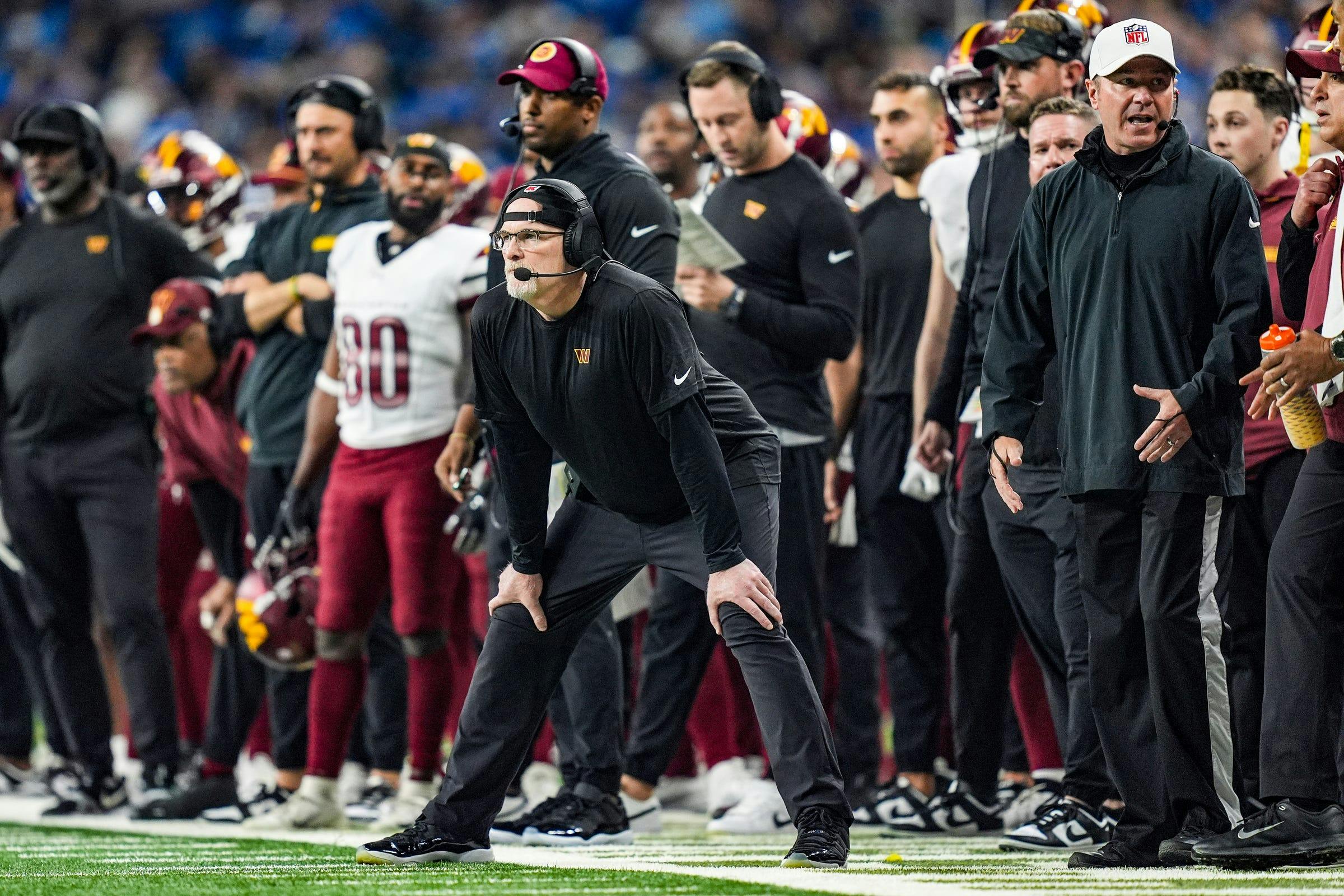 Washington Commanders head coach Dan Quinn on the sideline as we break down the Commanders Super Bowl odds and where they rank among the biggest long shots in NFL history.