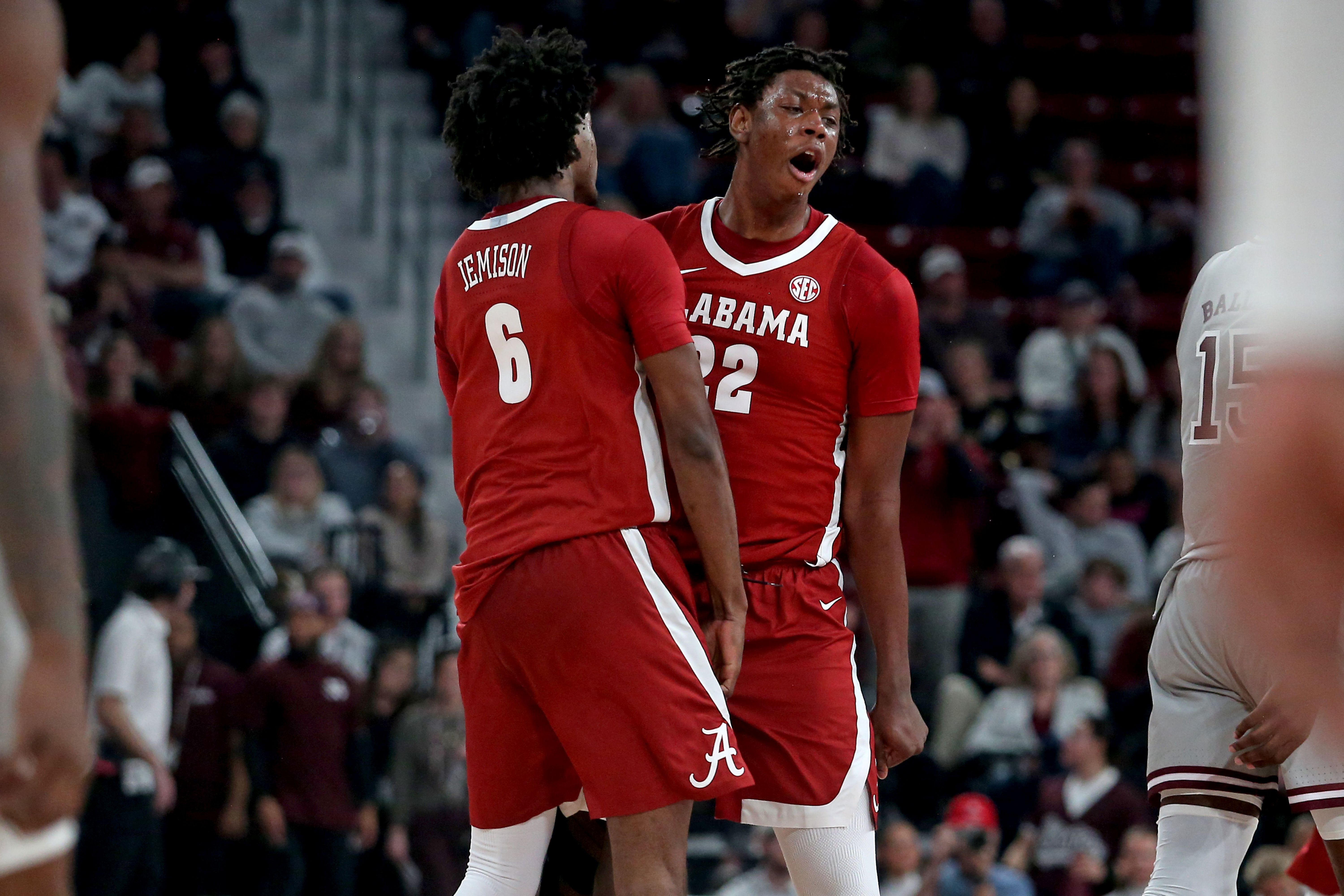 Alabama Crimson Tide forward London Jemison reacts with forward Aiden Sherrell, and he's key as we look at our Tennessee vs. Alabama prediction.