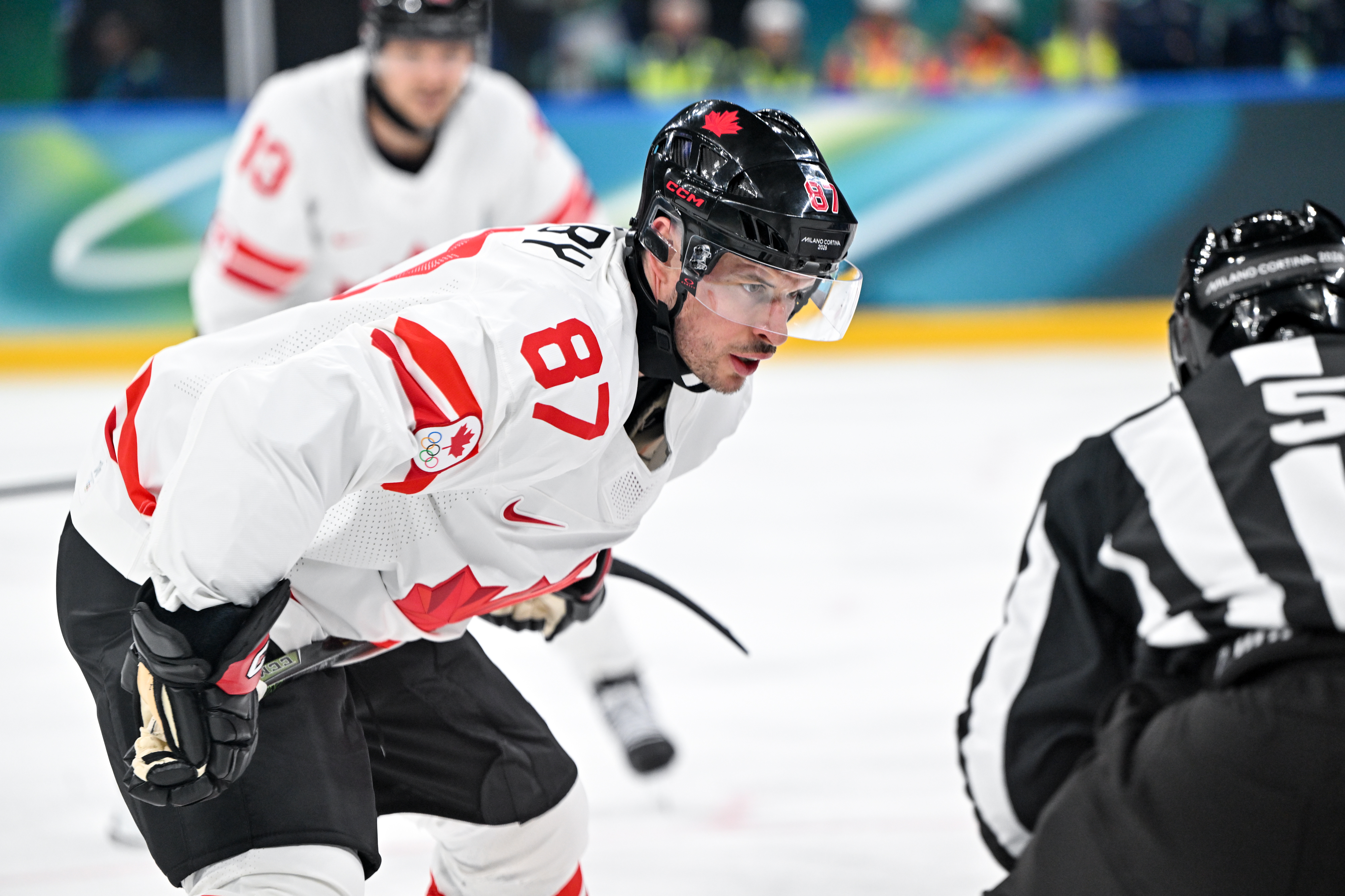 Sidney Crosby - who's featured in my Canada vs. Switzerland predictions - Canada before a faceoff. 
