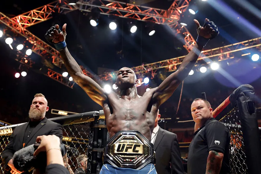 Israel Adesanya of Nigeria celebrates after knocking out Alex Pereira as we look at our Adesanya-Strickland picks