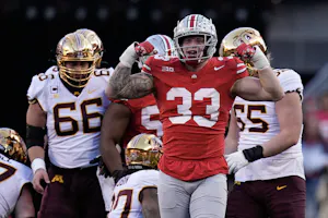 Ohio State Buckeyes defensive end Jack Sawyer celebrates a tackle during the first half of a football game against the Minnesota Golden Gophers at Ohio Stadium. The Buckeyes are a favorite by the 2025 College Football Championship Odds. 