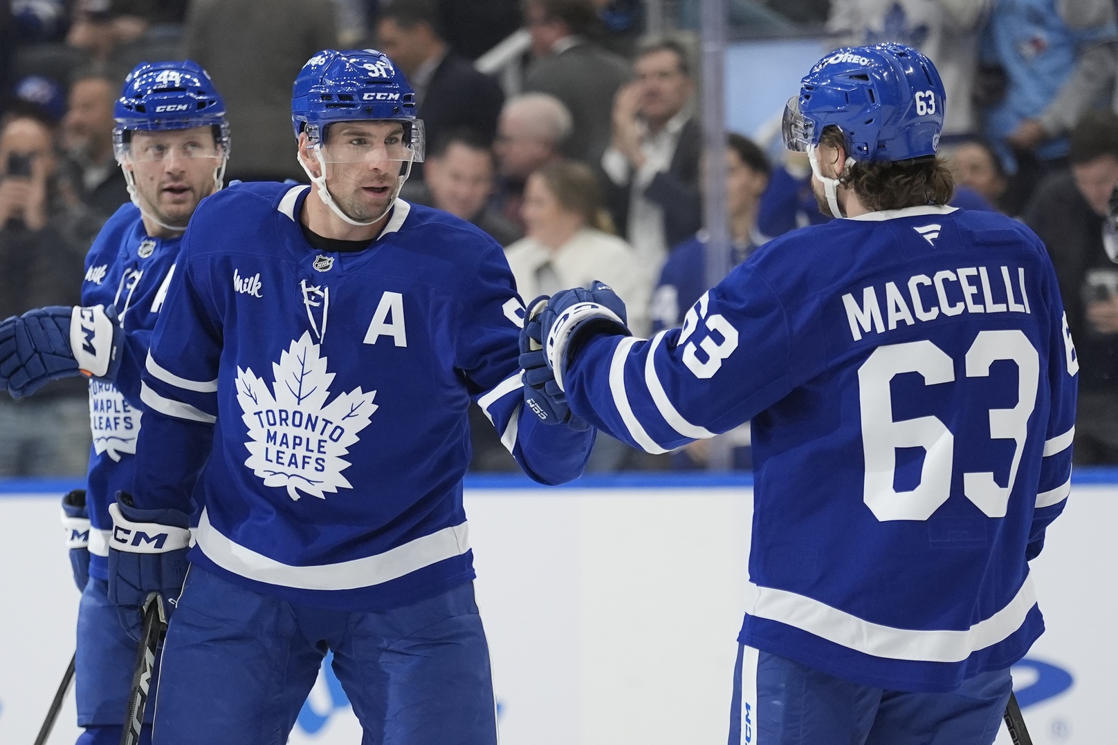 Toronto Maple Leafs forward Matias Maccelli congratulates forward John Tavares as we look at our Maple Leafs vs. Stars player props.