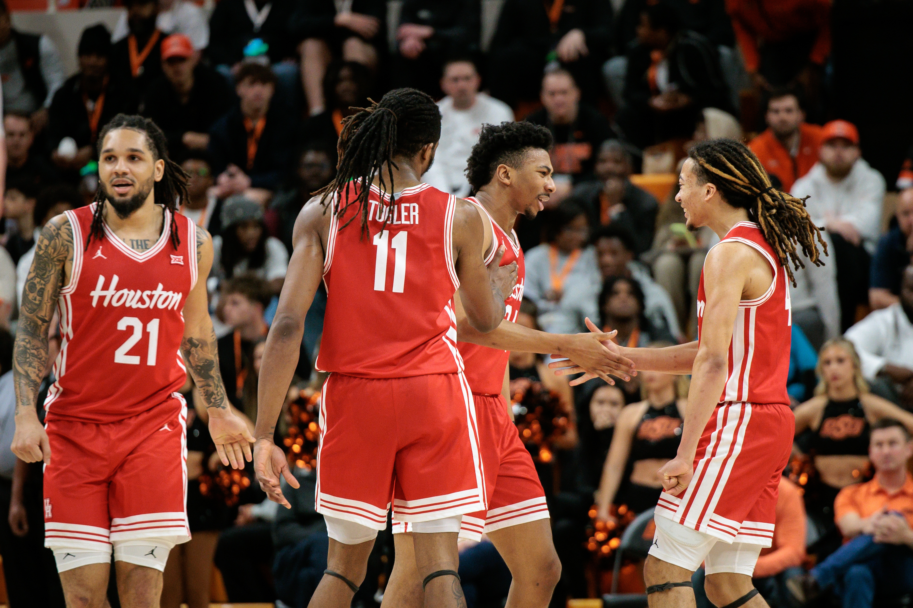 Houston Cougars guards Emanuel Sharp (21) and Kingston Flemings (4), featured in our Idaho vs. Houston prediction, react during a game earlier this season.