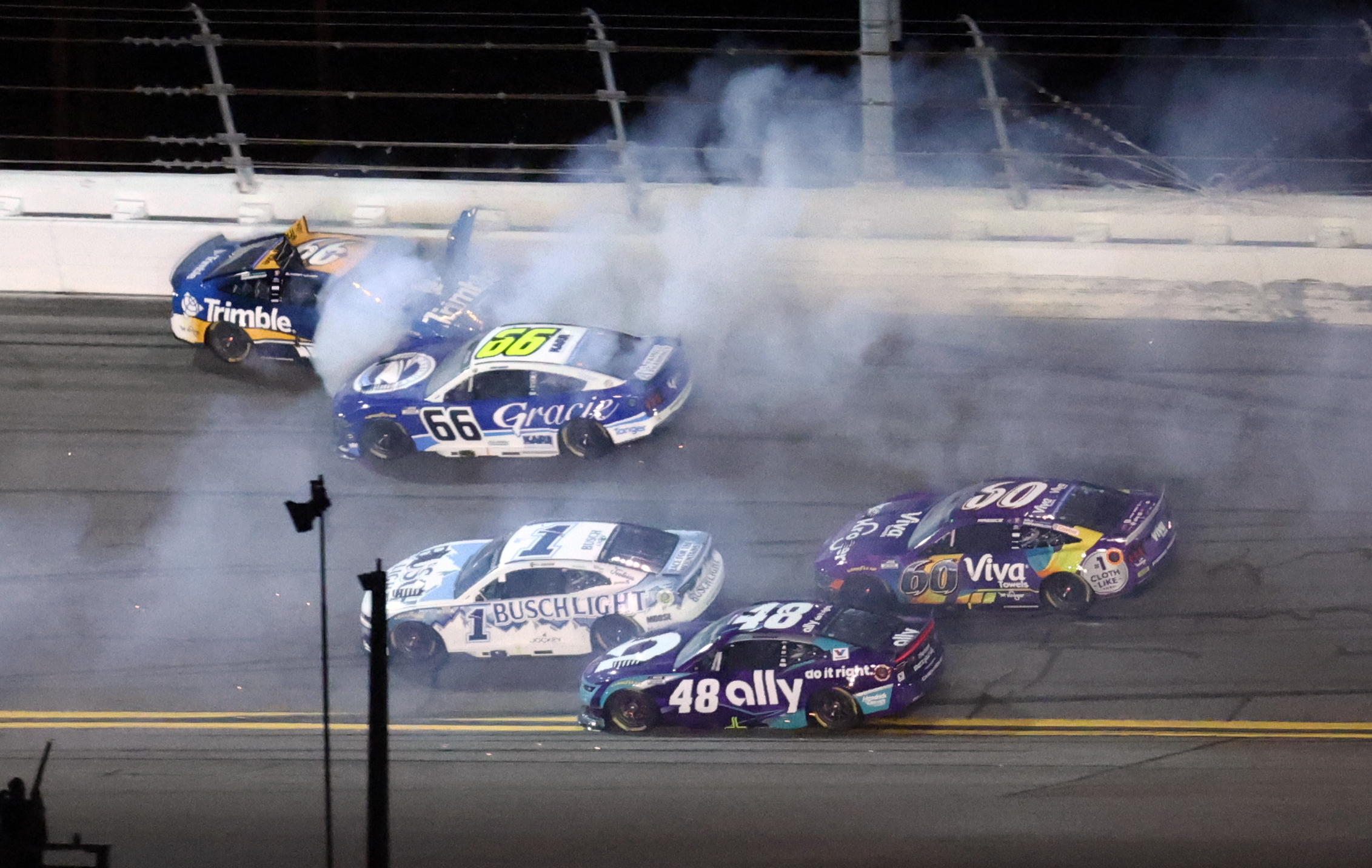 NASCAR Cup Series driver Corey LaJoie crashes as Casey Mears passes during Duel 1 at Daytona as we make our best Coke Zero Sugar 400 predictions.