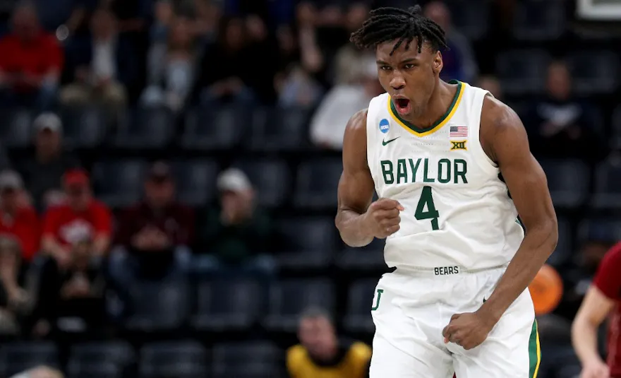 Ja'Kobe Walter #4 of the Baylor Bears reacts as we make our Clemson vs. Baylor prediction and pick for the second round of the NCAA Tournament on Saturday.