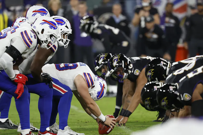 The Buffalo Bills offense lines up against the Baltimore Ravens defense as we offer our Divisional Round picks and preview for Round 2 of the NFL playoffs.