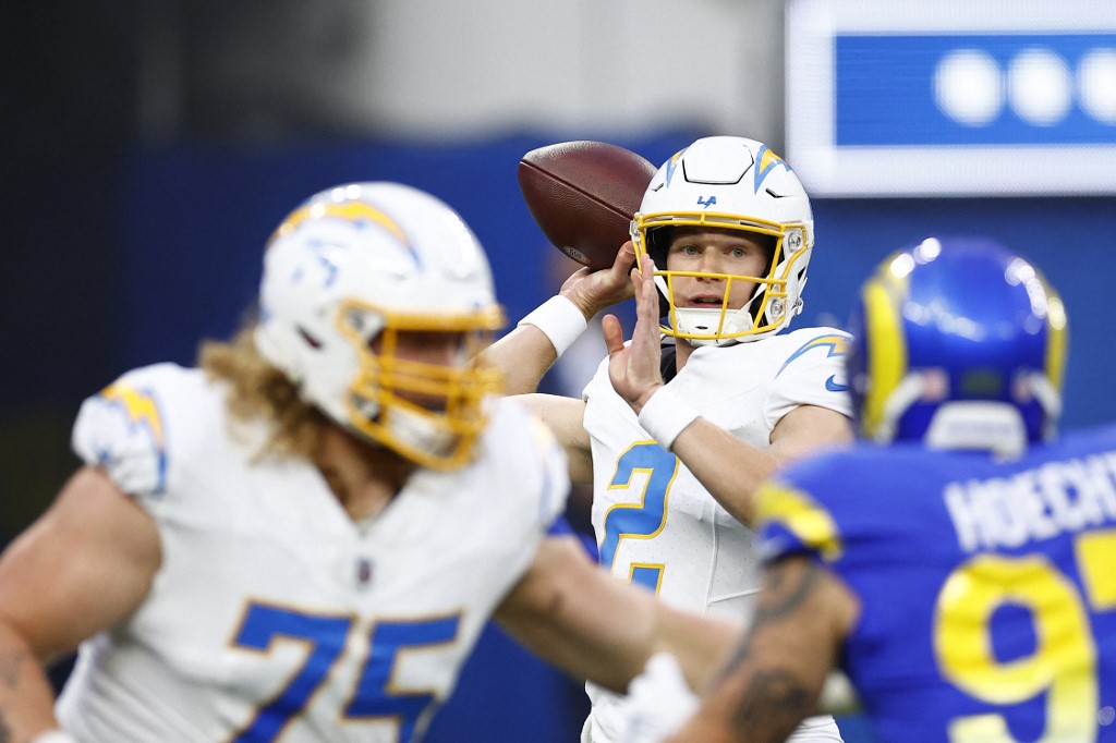 Easton Stick of the Los Angeles Chargers during a preseason game, and we offer new U.S. bettors our exclusive BetMGM bonus code for Saints vs. Chargers.