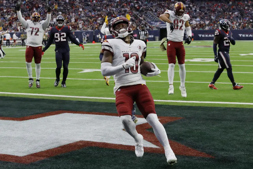 Curtis Samuel of the Washington Commanders scores a rushing touchdown in the second quarter of a game against the Houston Texans at NRG Stadium on November 20, 2022 in Houston, Texas.