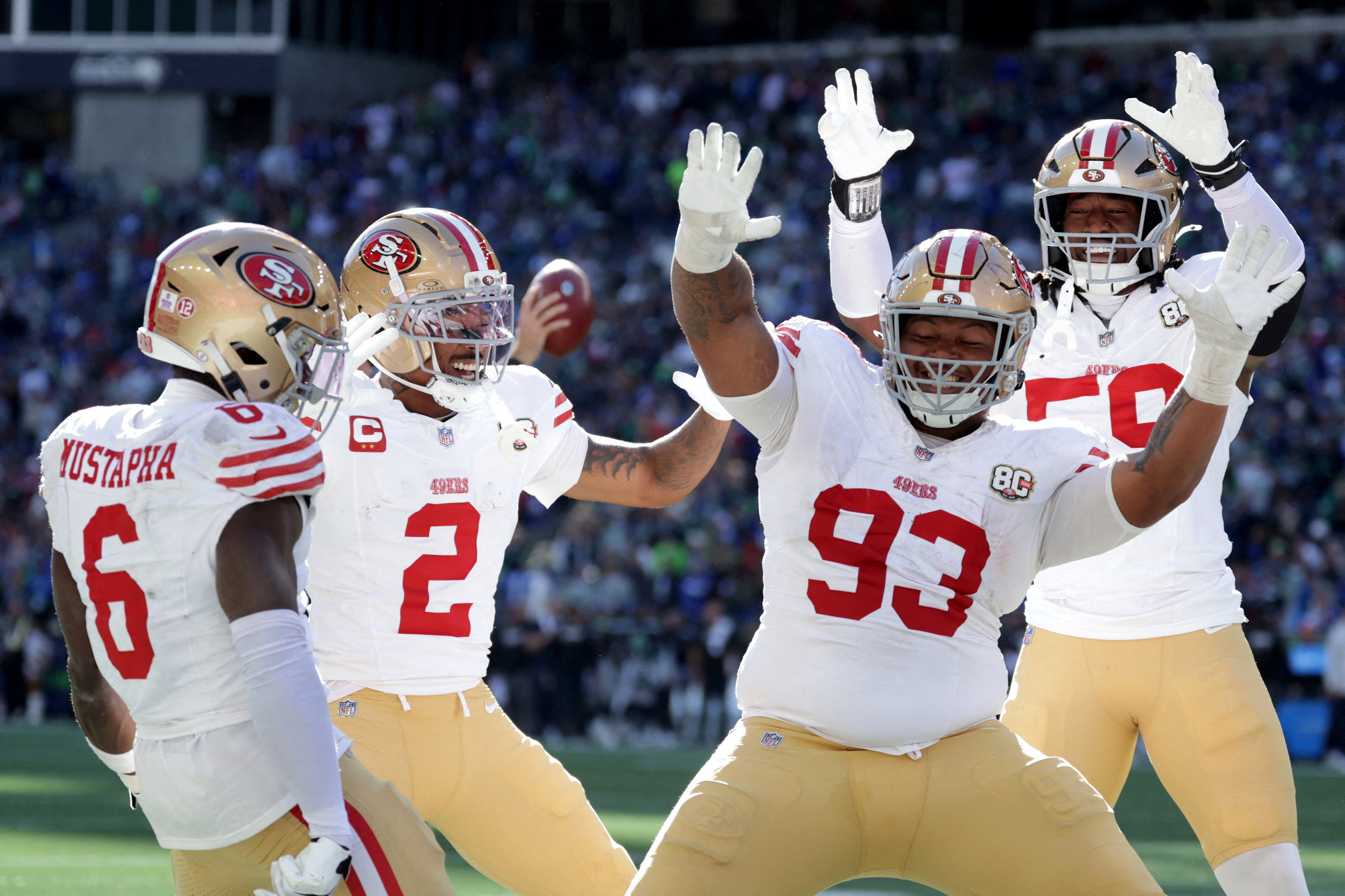 San Francisco 49ers celebrate as we look at the latest NFL Week 6 odds and betting lines.