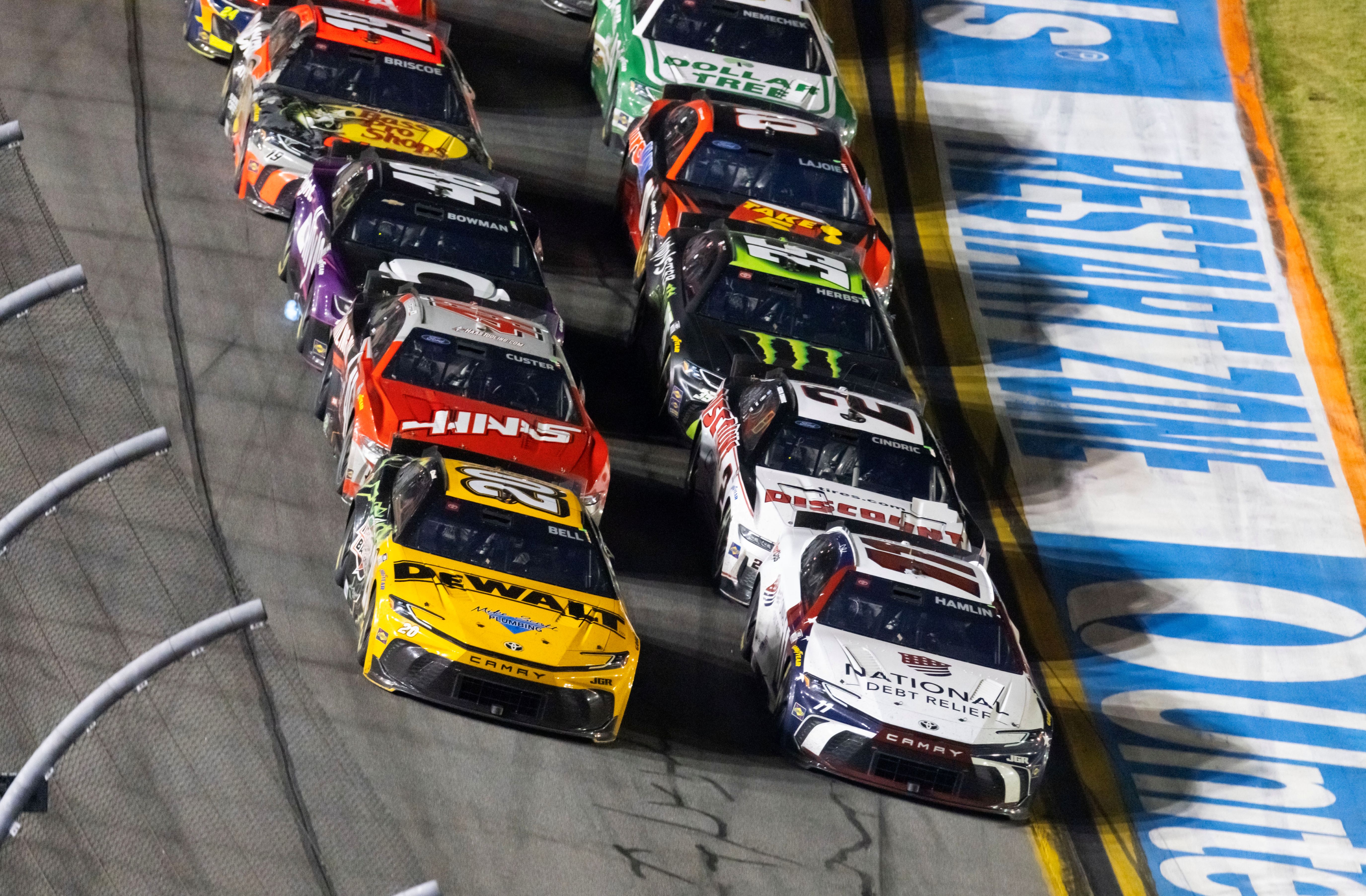 NASCAR Cup Series driver Christopher Bell (20) races alongside Denny Hamlin (11) as we break down the Daytona Duels odds and predictions for tonight's races.
