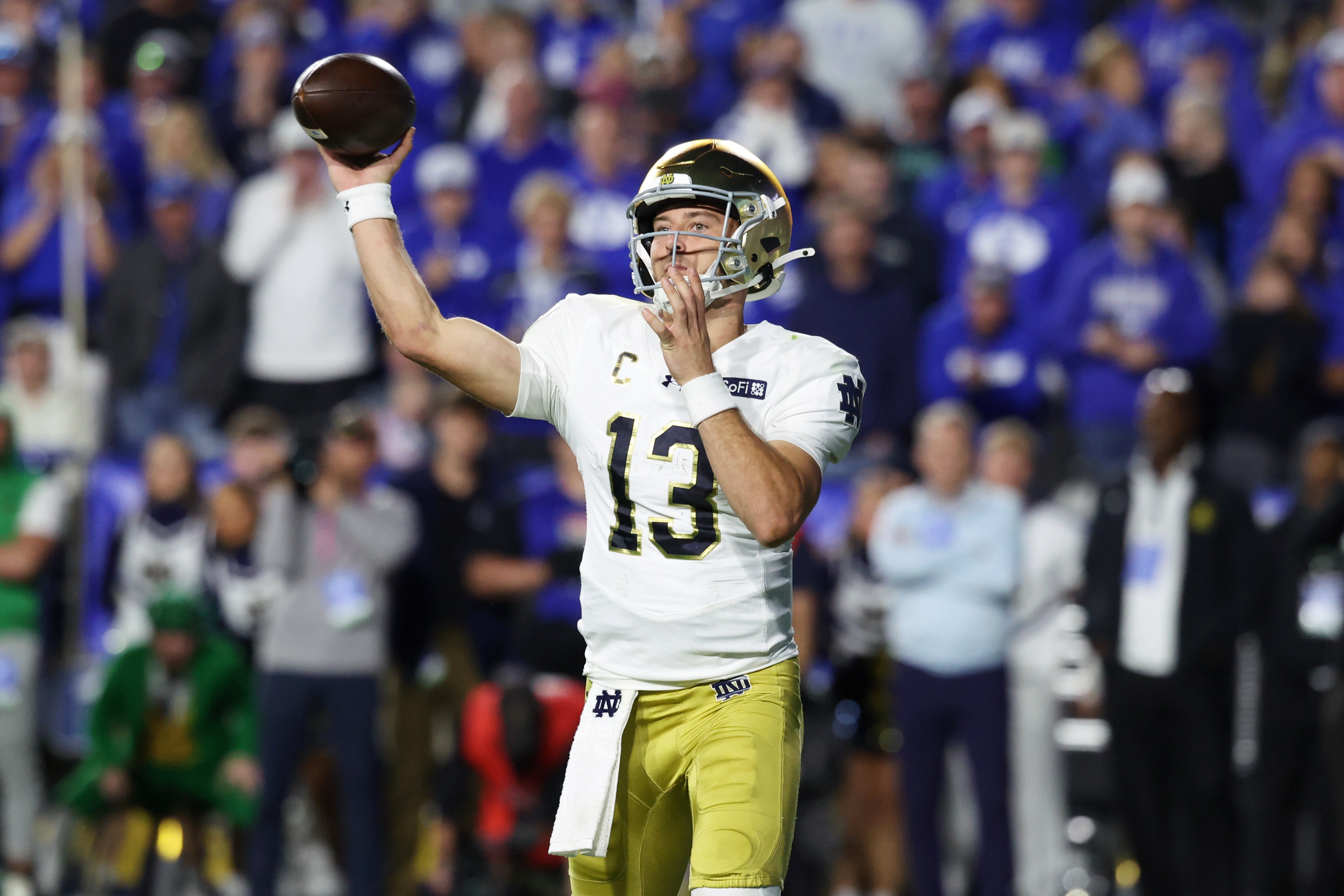 Notre Dame Fighting Irish quarterback CJ Carr (13) passes against the Brigham Young Cougars as we take a closer look at the College Football National Championship odds. 