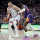Nikola Jokic of the Denver Nuggets is guarded by Deandre Ayton of the Phoenix Suns as we look at the NBA Finals MVP odds