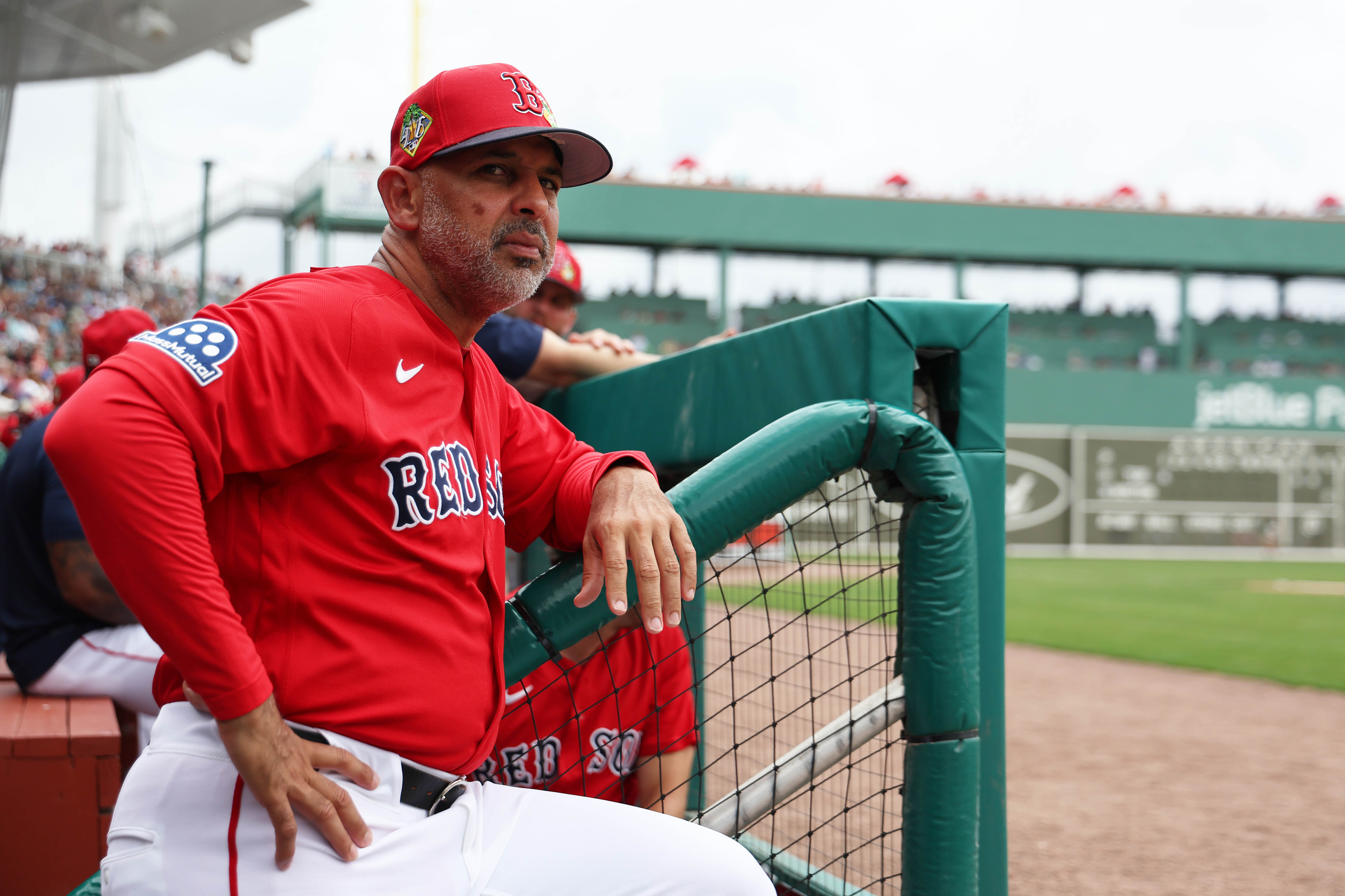 Boston Red Sox manager Alex Cora looks on during a spring training game against the Toronto Blue, and we look at whether his team did enough to lead our AL East picks this year. 