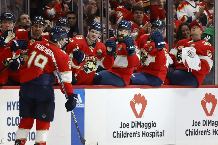 Teammates congratulate Matthew Tkachuk of the Florida Panthers after he scored a first period goal against the Tampa Bay Lightning at the FLA Live Arena during an NHL game on October 21, 2022 in Sunrise, Florida. Photo by Joel Auerbach Getty Images via AF
