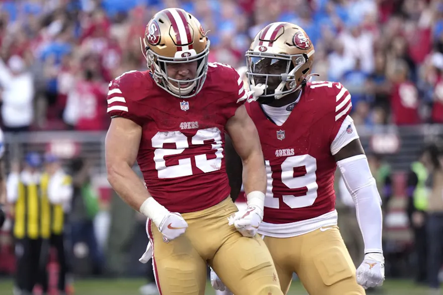 Christian McCaffrey of the San Francisco 49ers celebrates with teammates after scoring a touchdown against the Detroit Lions, and we offer our top Christian McCaffrey Super Bowl player props based on the best NFL odds.