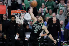 Jayson Tatum of the Boston Celtics goes up for a dunk against the Cleveland Cavaliers during Game 5 of the NBA playoffs. We're backing Tatum in our Pacers vs. Celtics parlay.