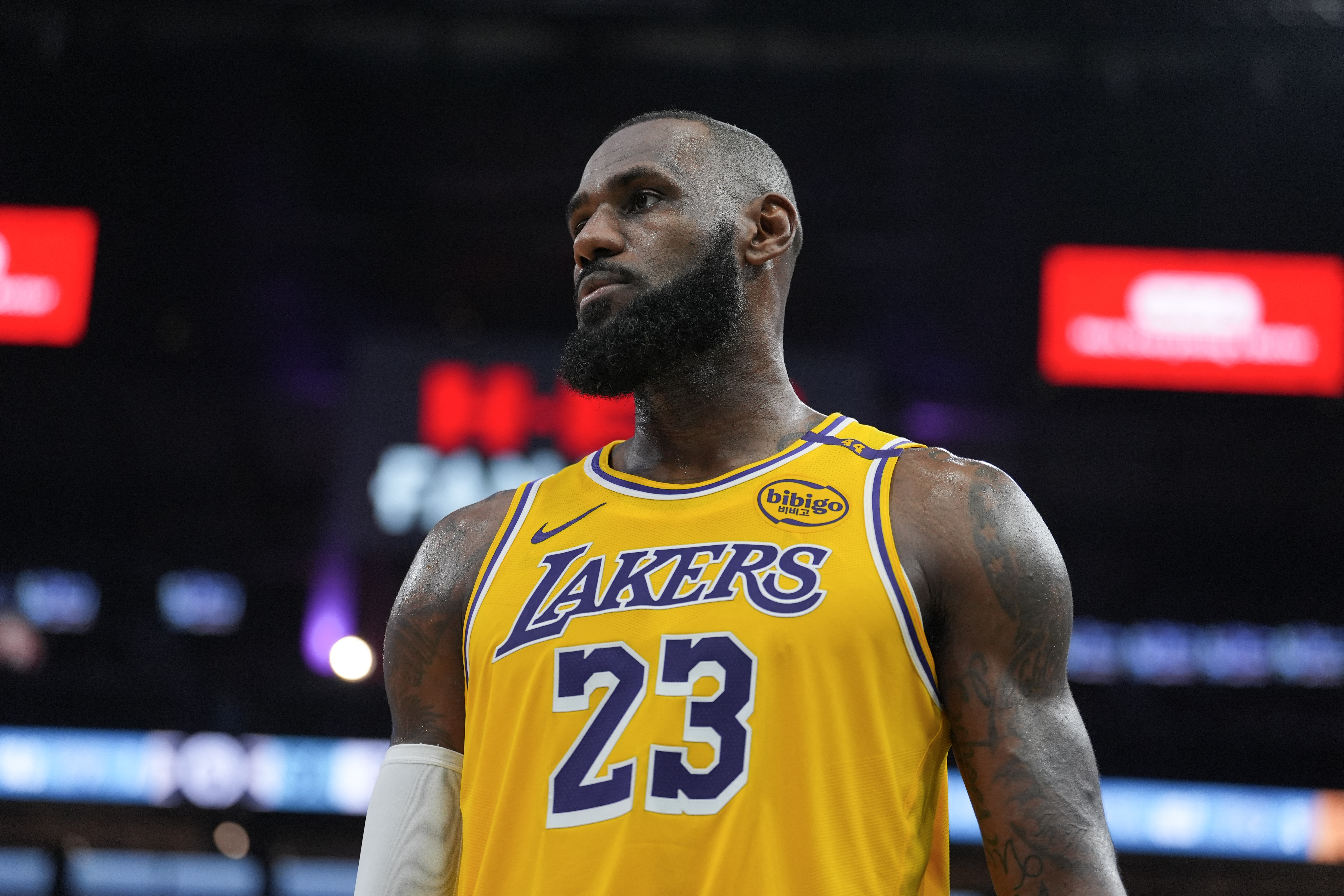 Los Angeles Lakers forward LeBron James (23), seen here looking over, is featured in our Celtics vs. Lakers player props today.