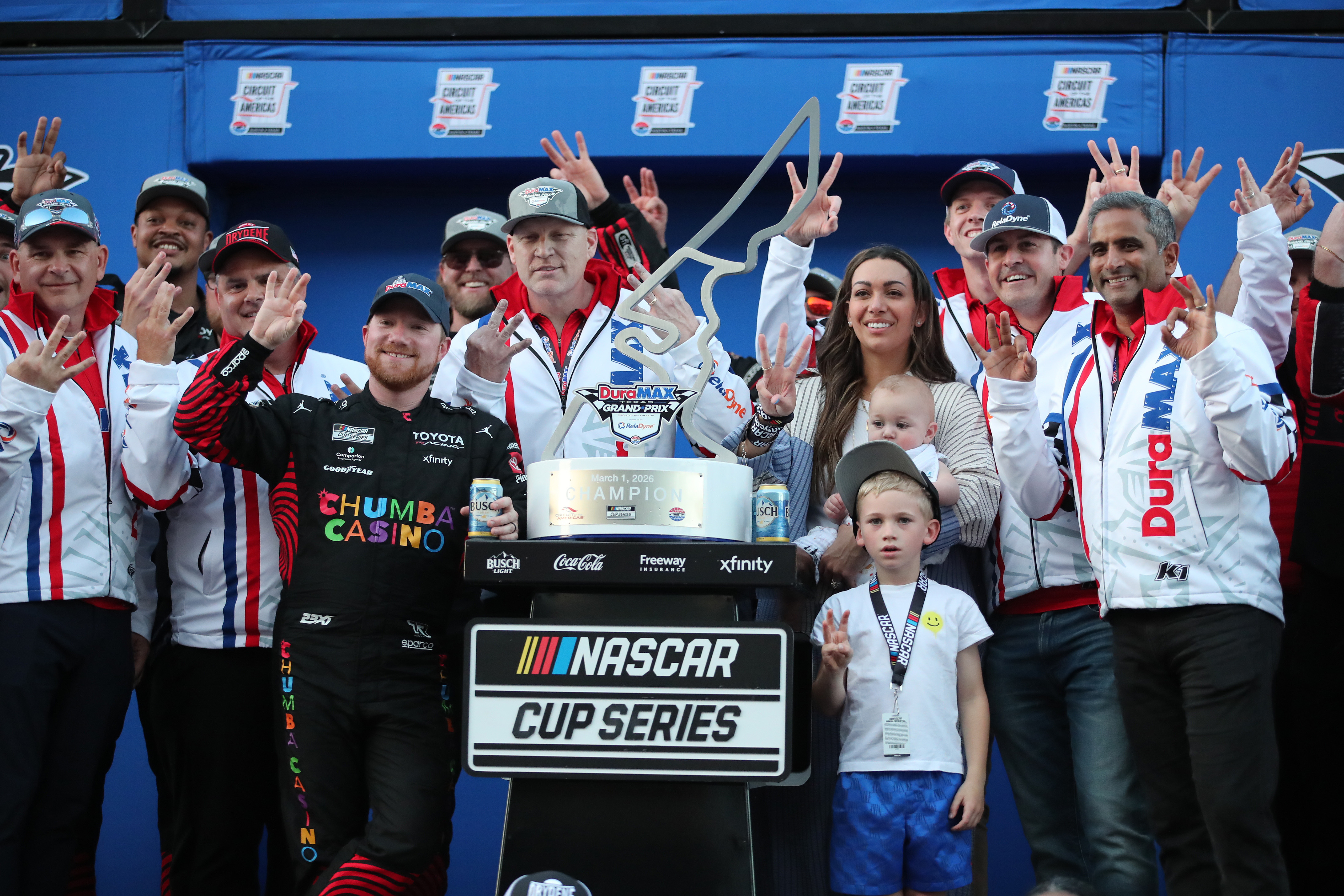 NASCAR Cup Series driver Tyler Reddick (45), who is featured in our NASCAR championship odds breakdown, and his family celebrate winning the NASCAR Cup Series Duramax Texas Grand Prix.