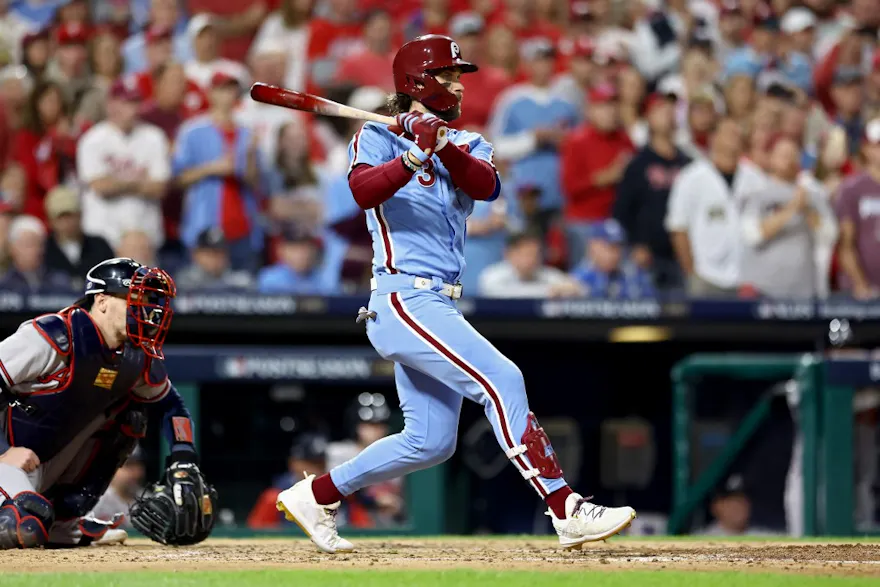 Bryce Harper #3 of the Philadelphia Phillies hits a single as we look at our Diamondbacks-Phillies predictions for Game 1