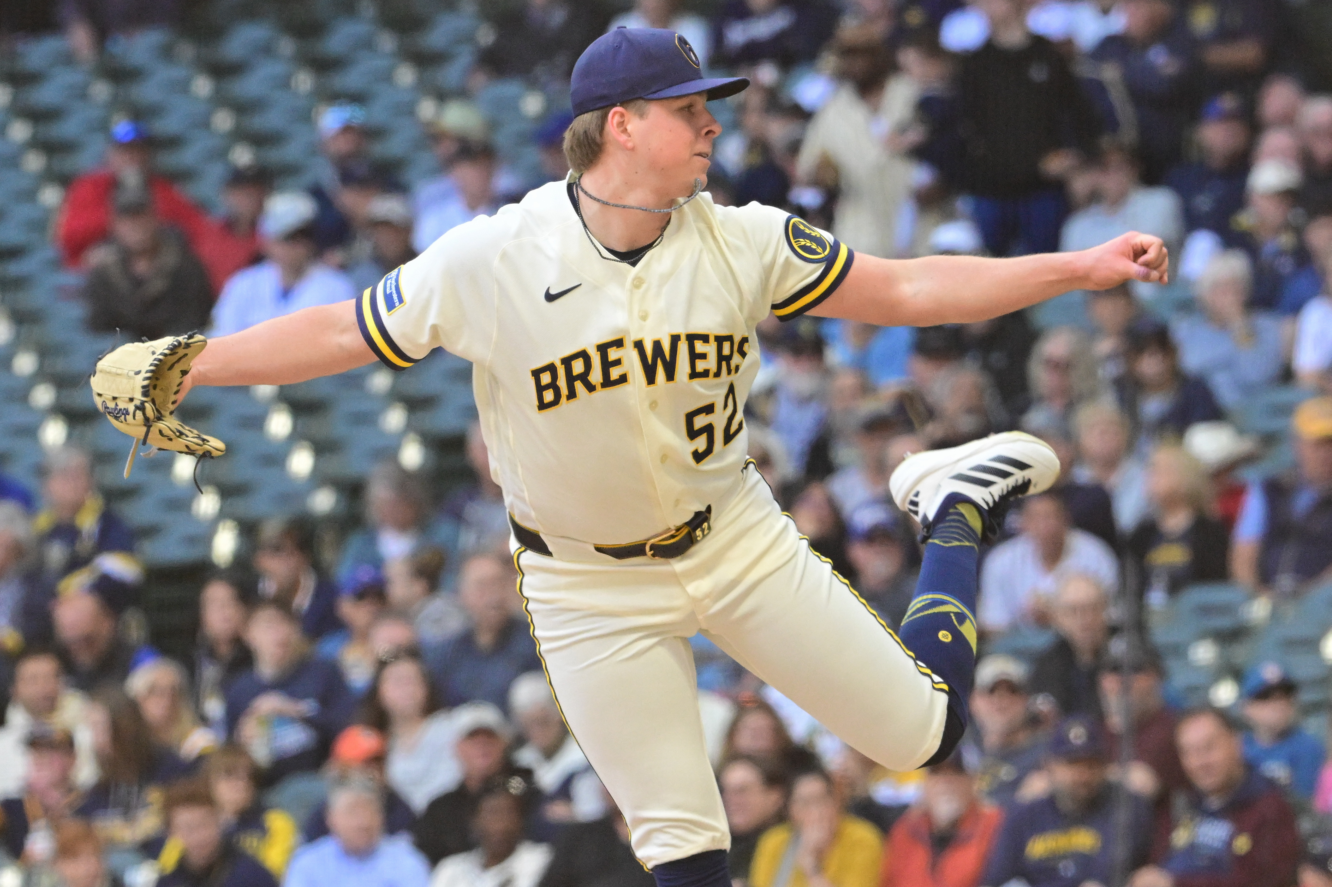 Milwaukee Brewers starting pitcher Kyle Harrison (52) throws a pitch as he is featured in our Brewers vs. Cubs win probability.