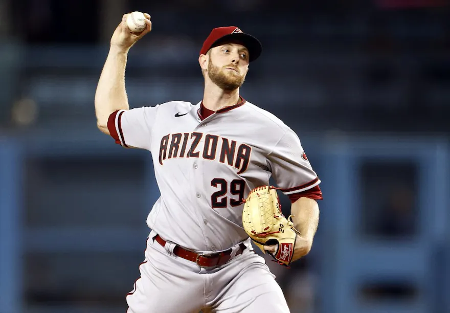 Merrill Kelly of the Arizona Diamondbacks throws against the Los Angeles Dodgers in the first inning at Dodger Stadium.