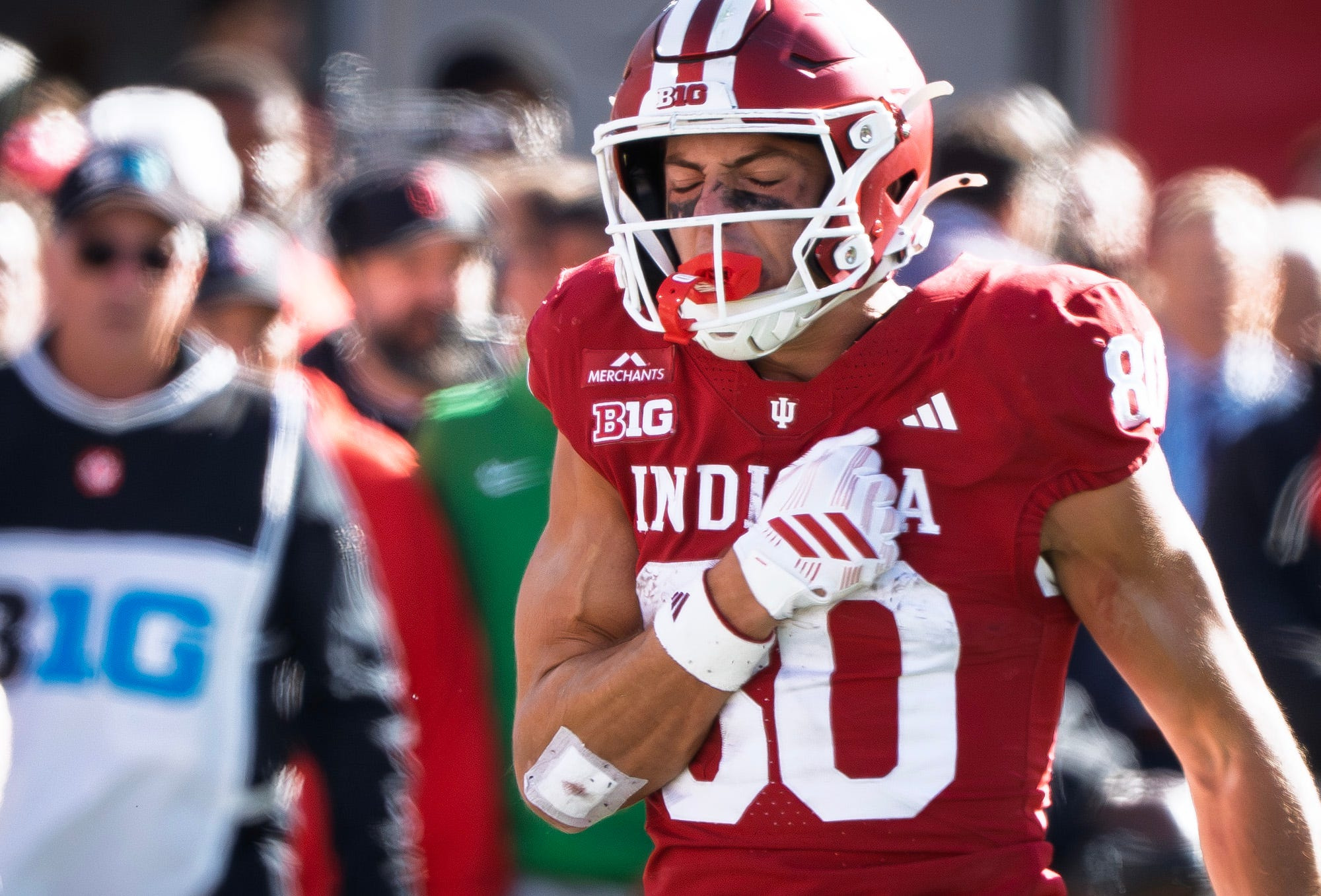 Indiana's Charlie Becker (80) celebrates a catch as he is featured in our Indiana vs. Michigan touchdown pick.