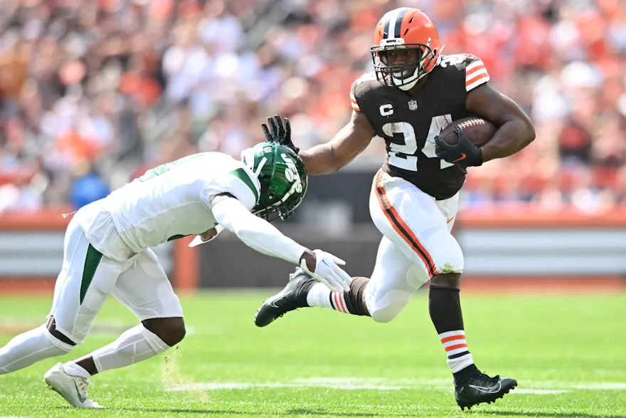 Nick Chubb of the Cleveland Browns runs with the ball before being tackled by D.J. Reed of the New York Jets during the first quarter.