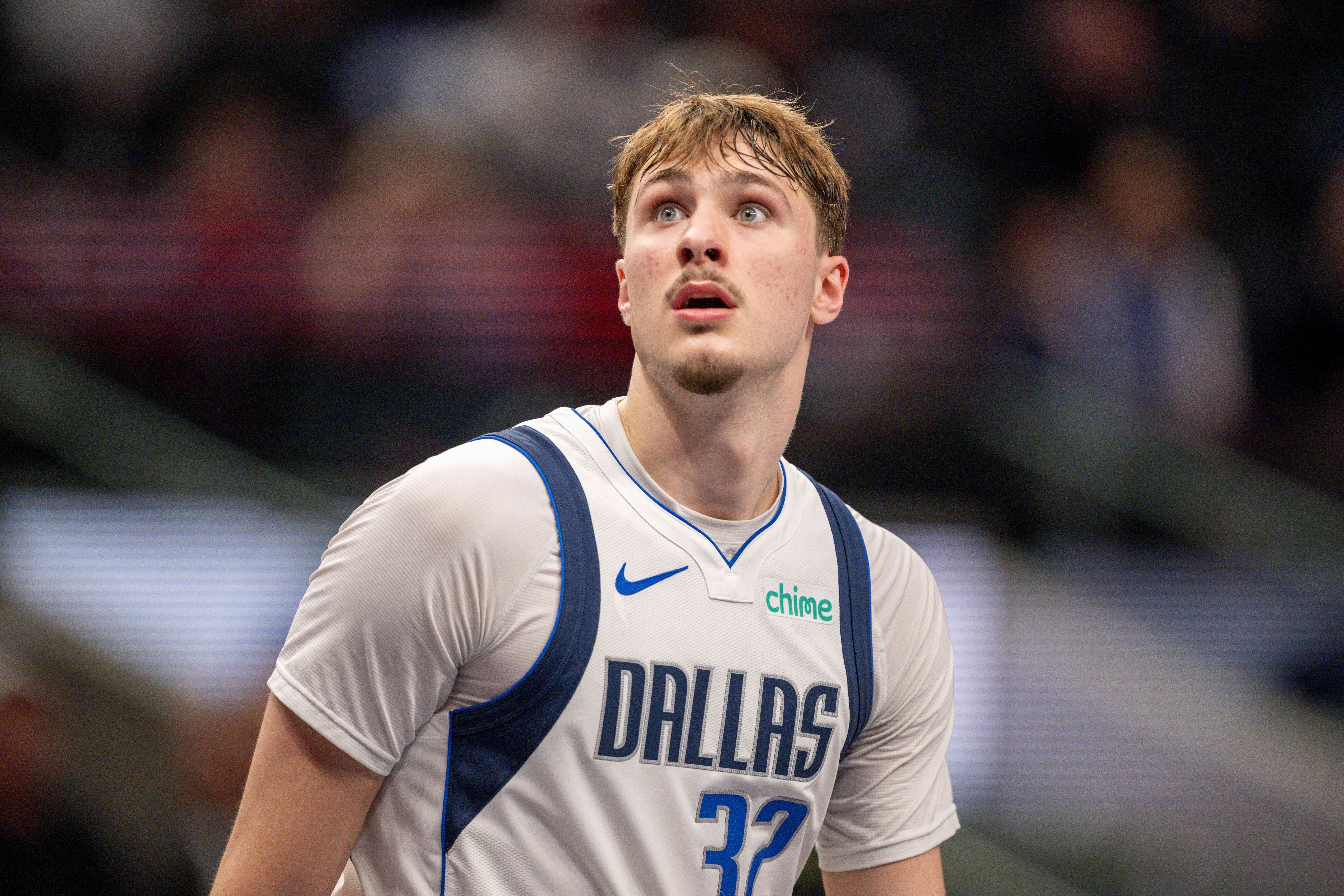 Dallas Mavericks forward Cooper Flagg (32), seen here looking on during a game, is featured in our Warriors vs. Mavericks player props today.