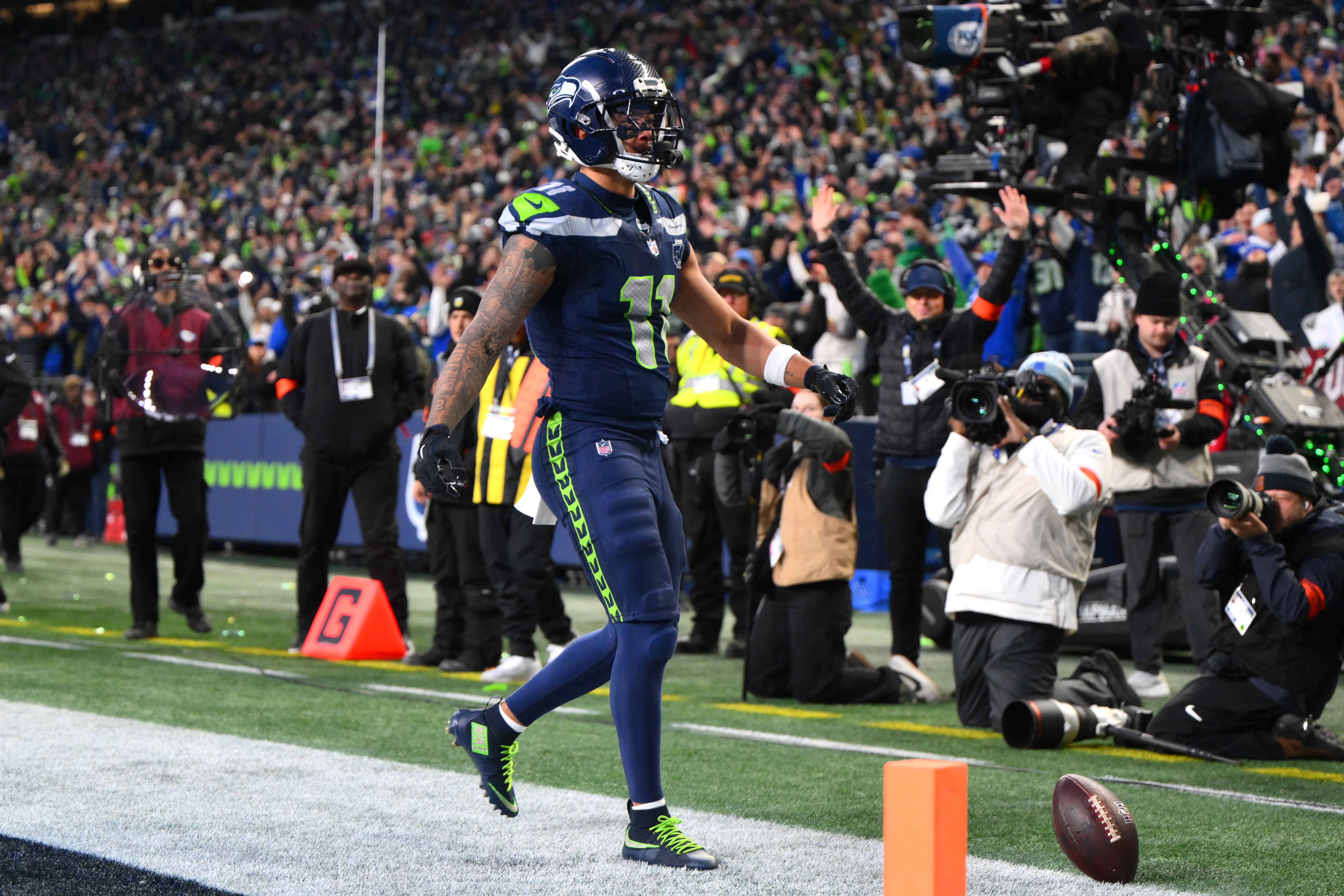 Seattle Seahawks wide receiver Jaxon Smith-Njigba (11) celebrates after scoring a touchdown in the NFC Championship Game.