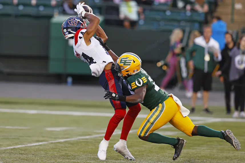 Montreal Alouettes wide receiver Charleston Rambo catches the ball against the Edmonton Elks. We're backing the Alouettes in our Alouettes vs. Roughriders prediction.
