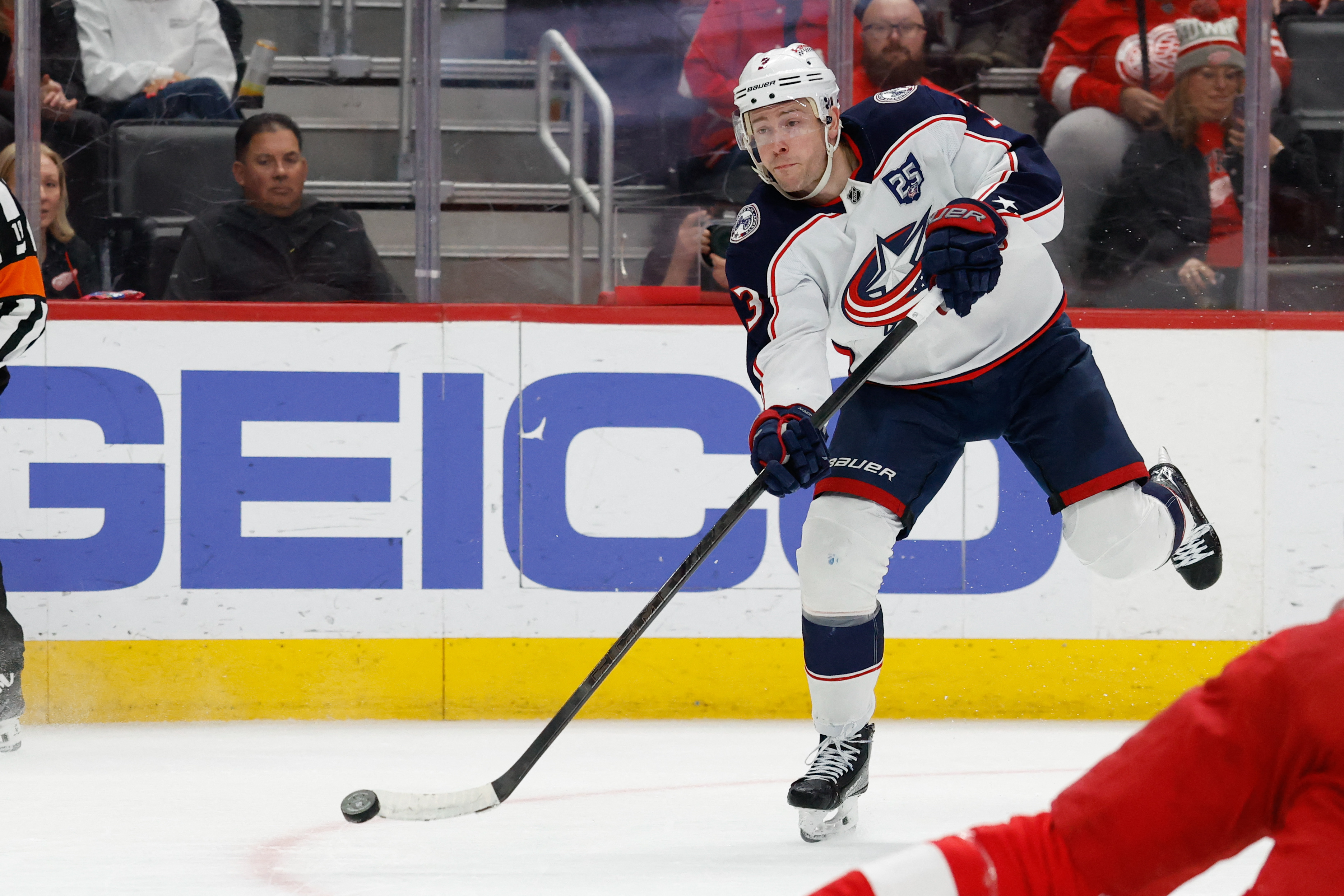 Columbus Blue Jackets center Charlie Coyle (3) takes a shot as he is featured in our Bruins vs. Blue Jackets prediction.