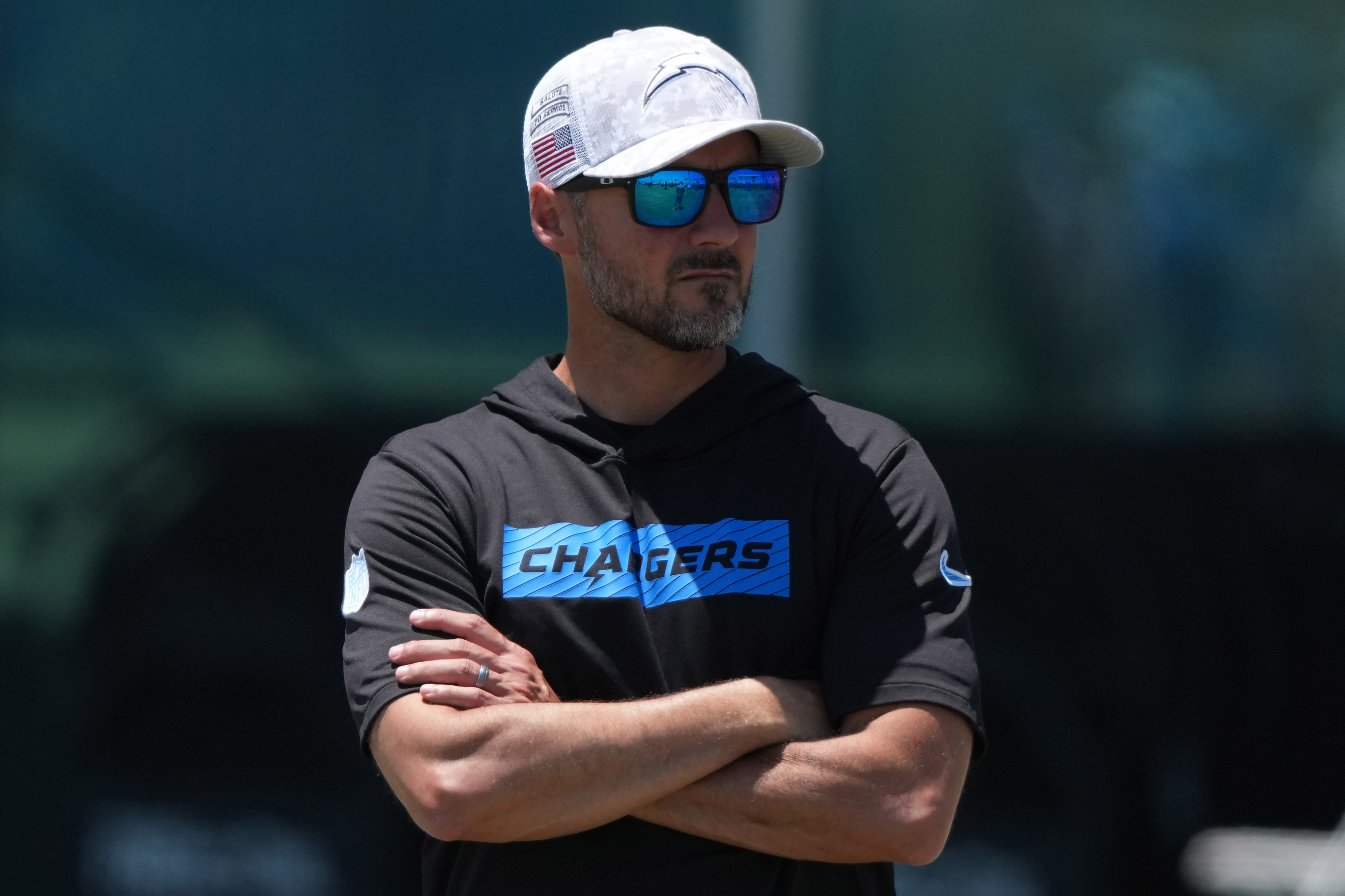Los Angeles Chargers defensive coordinator Jesse Minter, who is featured in our Ravens next head coach predictions, watches during organized team activities.