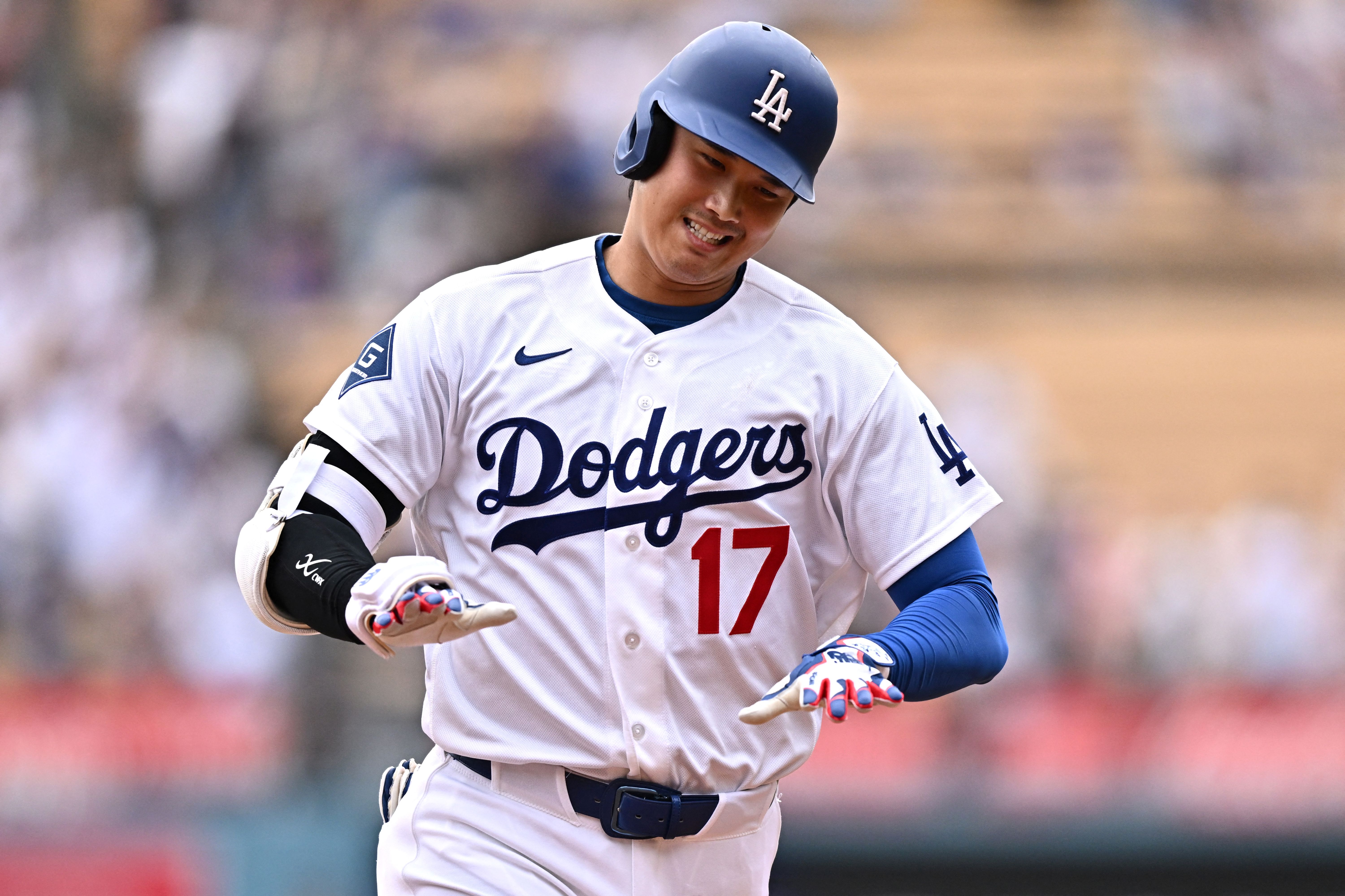 Los Angeles Dodgers two-way player Shohei Ohtani (17) celebrates as we break down our home run predictions today.