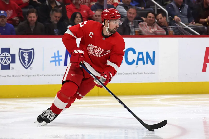 Detroit Red Wings center Dylan Larkin carries the puck as we examine PrizePicks new free-to-play pick'em game launching in Michigan.